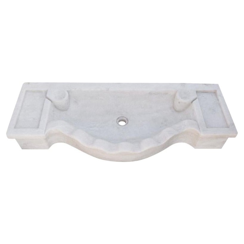 This timeless beautiful Italian classical sink is cut from one single block of Carrara marble, these designs have not changed since Greek and Roman times, it carries superb artistic merit easily fitting in with old and new buildings.

Custom sizing