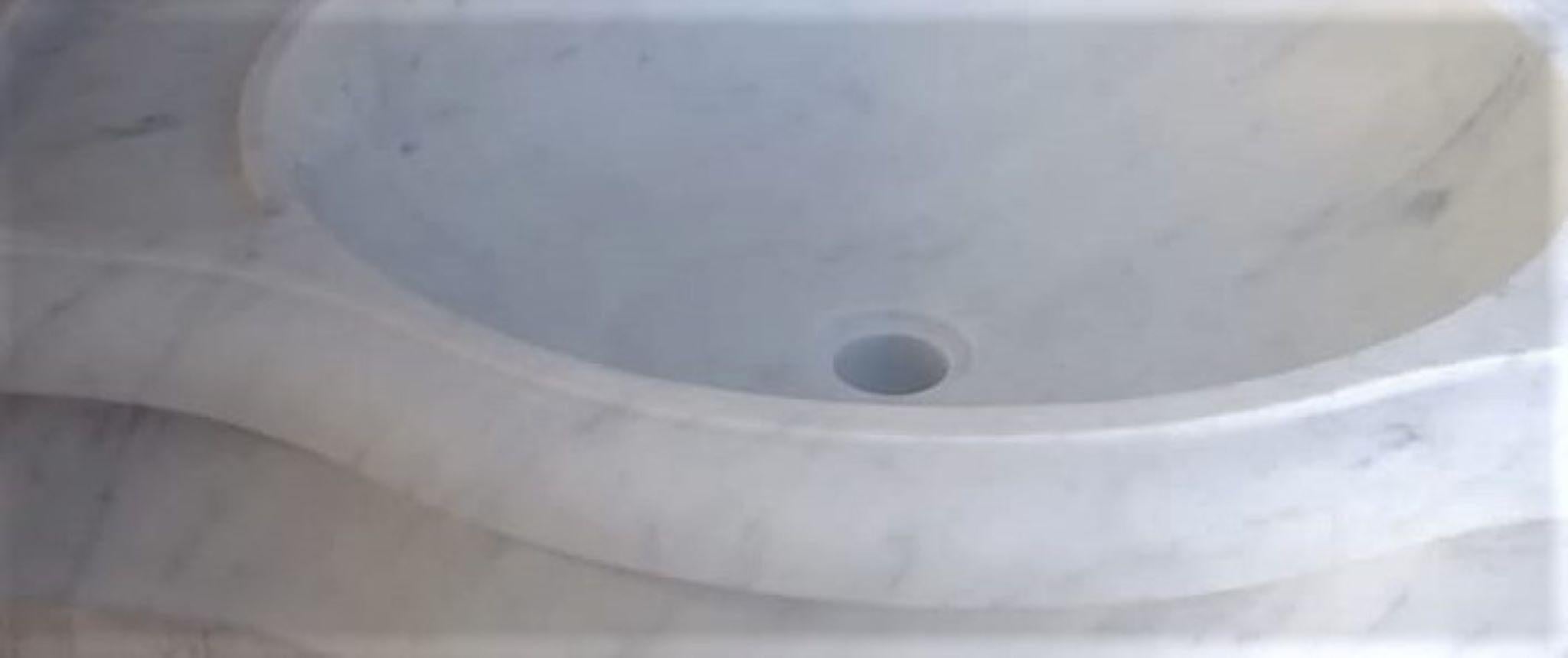 carved stone sink