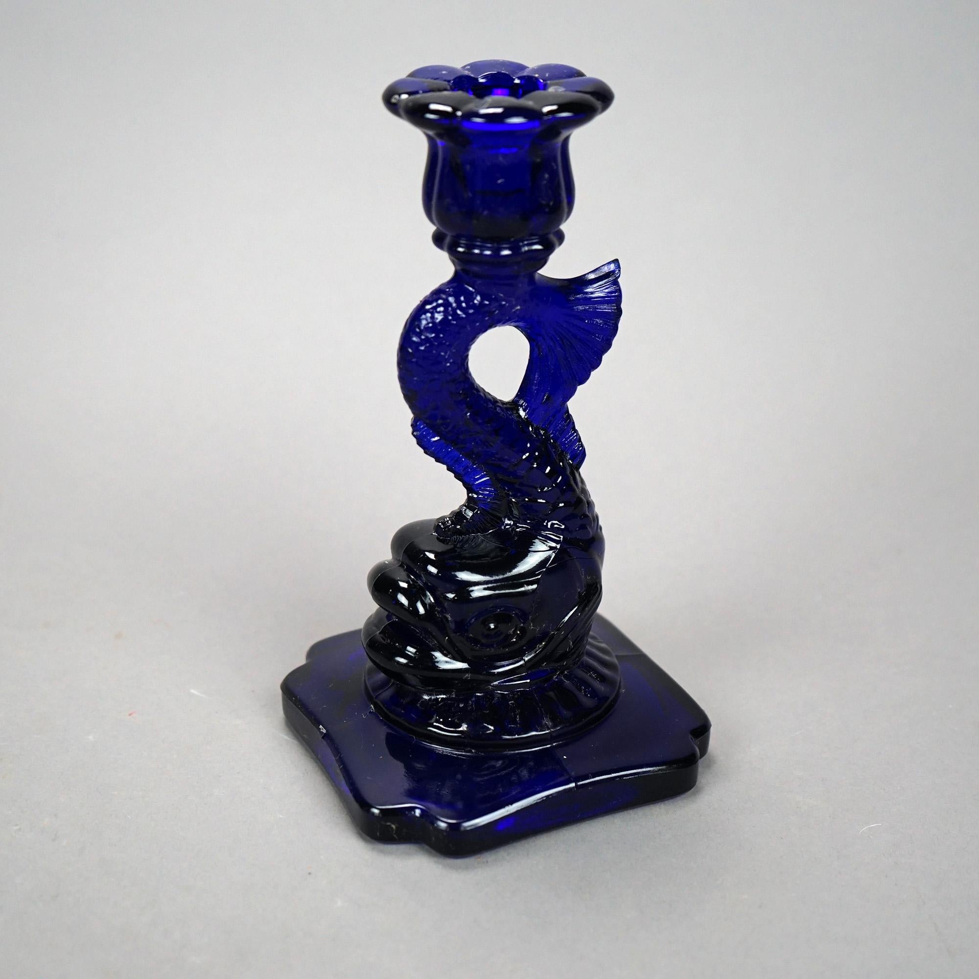 Molded Classical Dolphin Form Cobalt Glass Candlesticks, 20th C