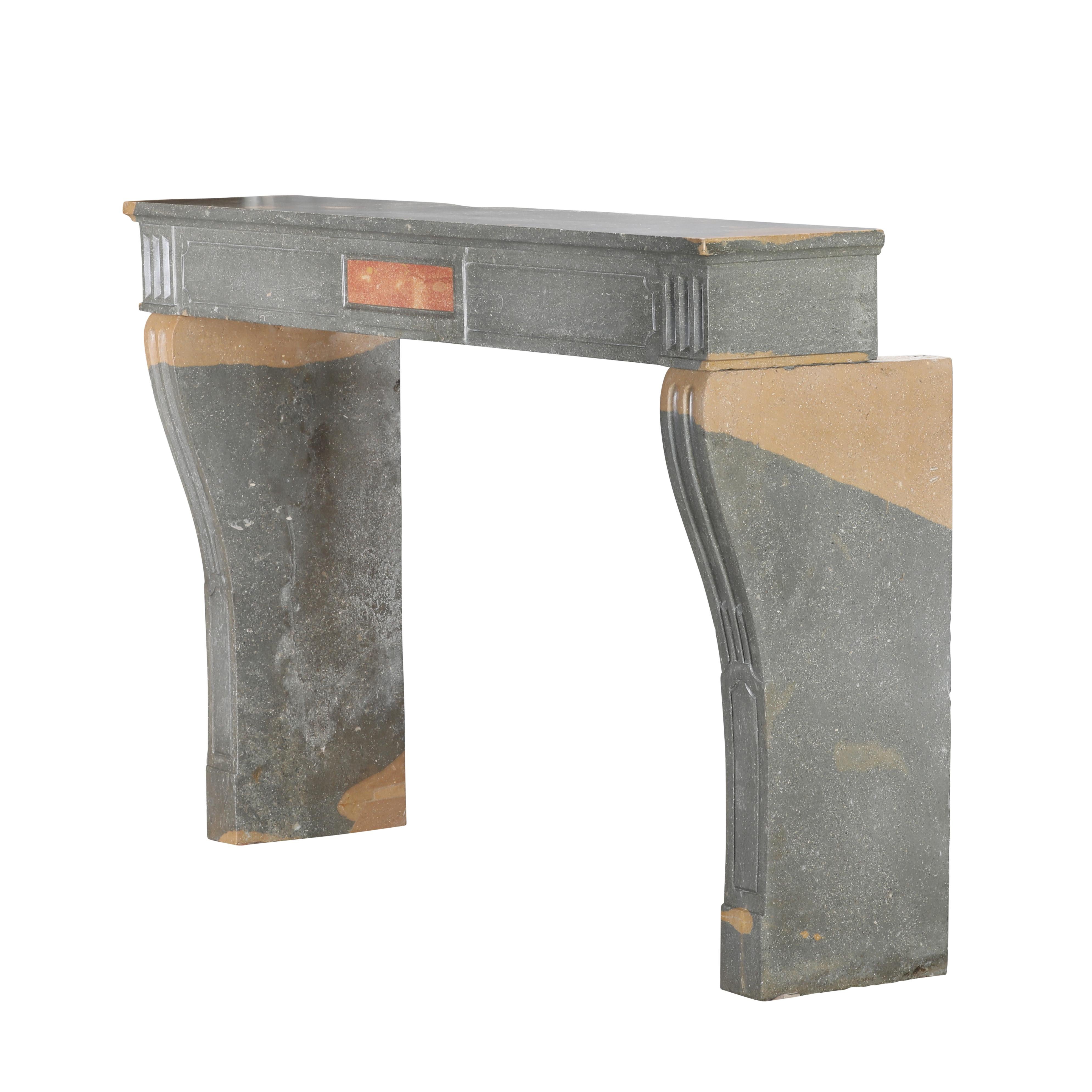 Classical French Antique Fireplace Mantel in Grey-Green Stone With Warm Accents For Sale 7