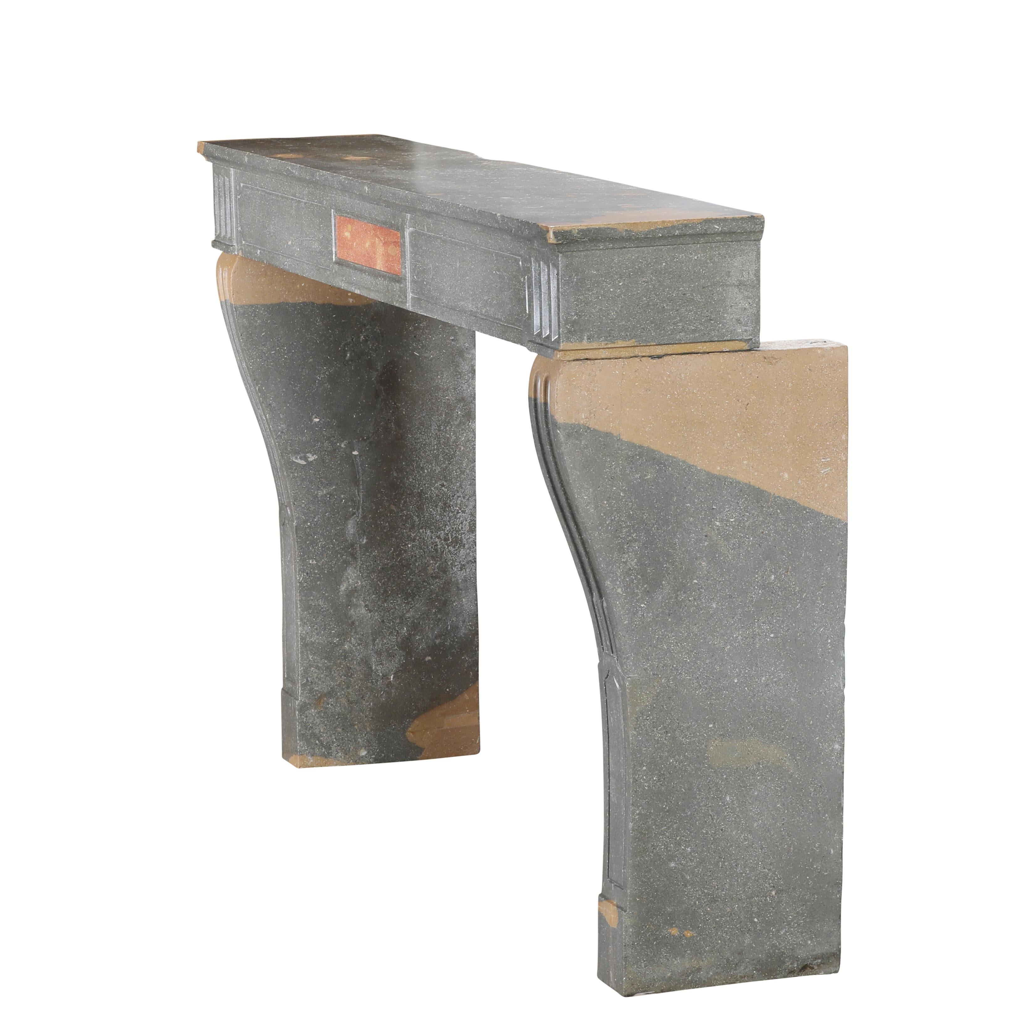 Classical French Antique Fireplace Mantel in Grey-Green Stone With Warm Accents For Sale 9