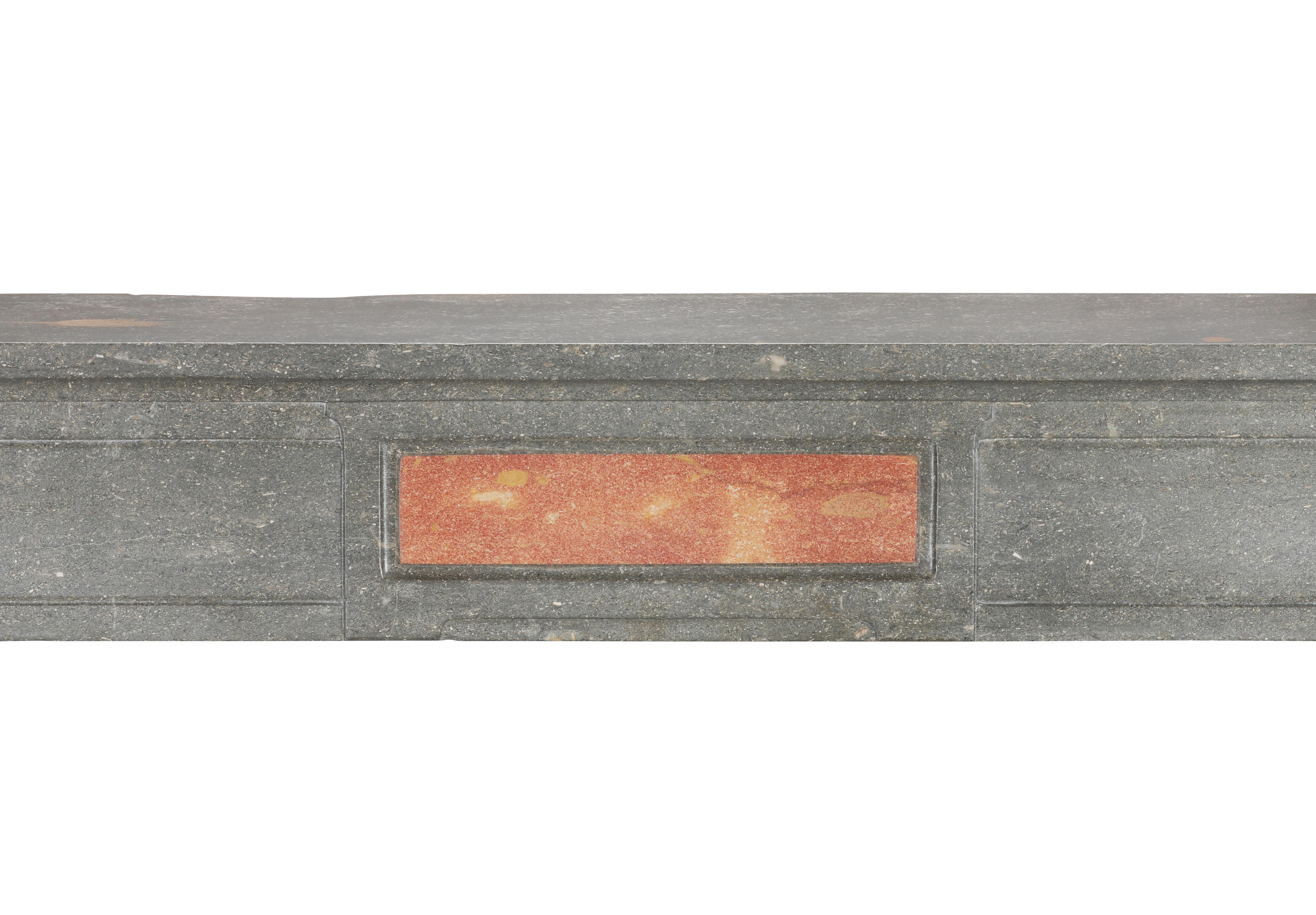 Hand-Carved Classical French Antique Fireplace Mantel in Grey-Green Stone With Warm Accents For Sale