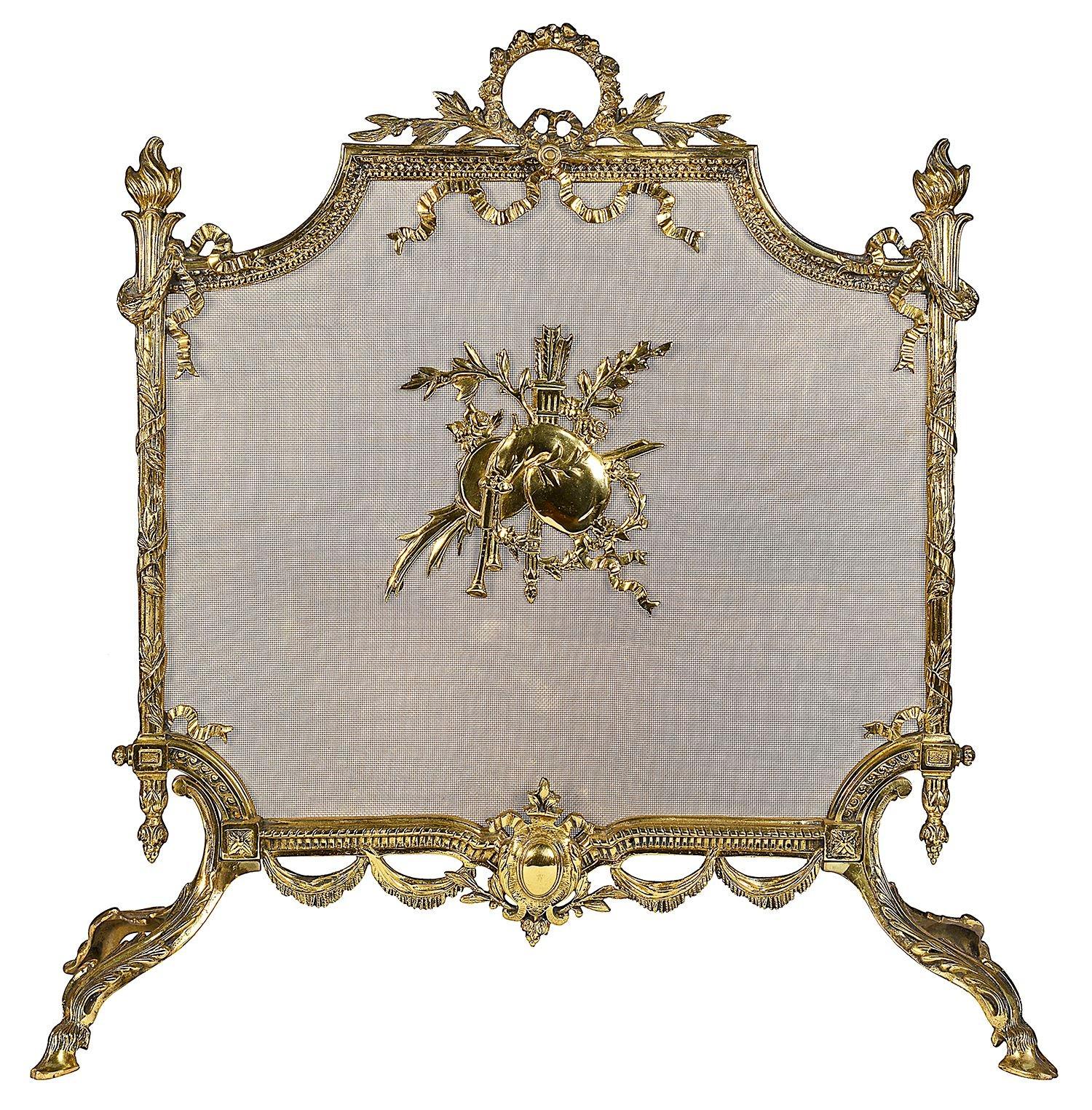Late 19th Century French gilded ormolu fire scree, having classical scrolling foliate, motif and ribbon decoration. the central mount of musical instruments and an arrow quiver, raised on hoof feet.
 
Batch 73 61671 CZZN
 
 
 
 
 
Batch 73 61671 CZZN