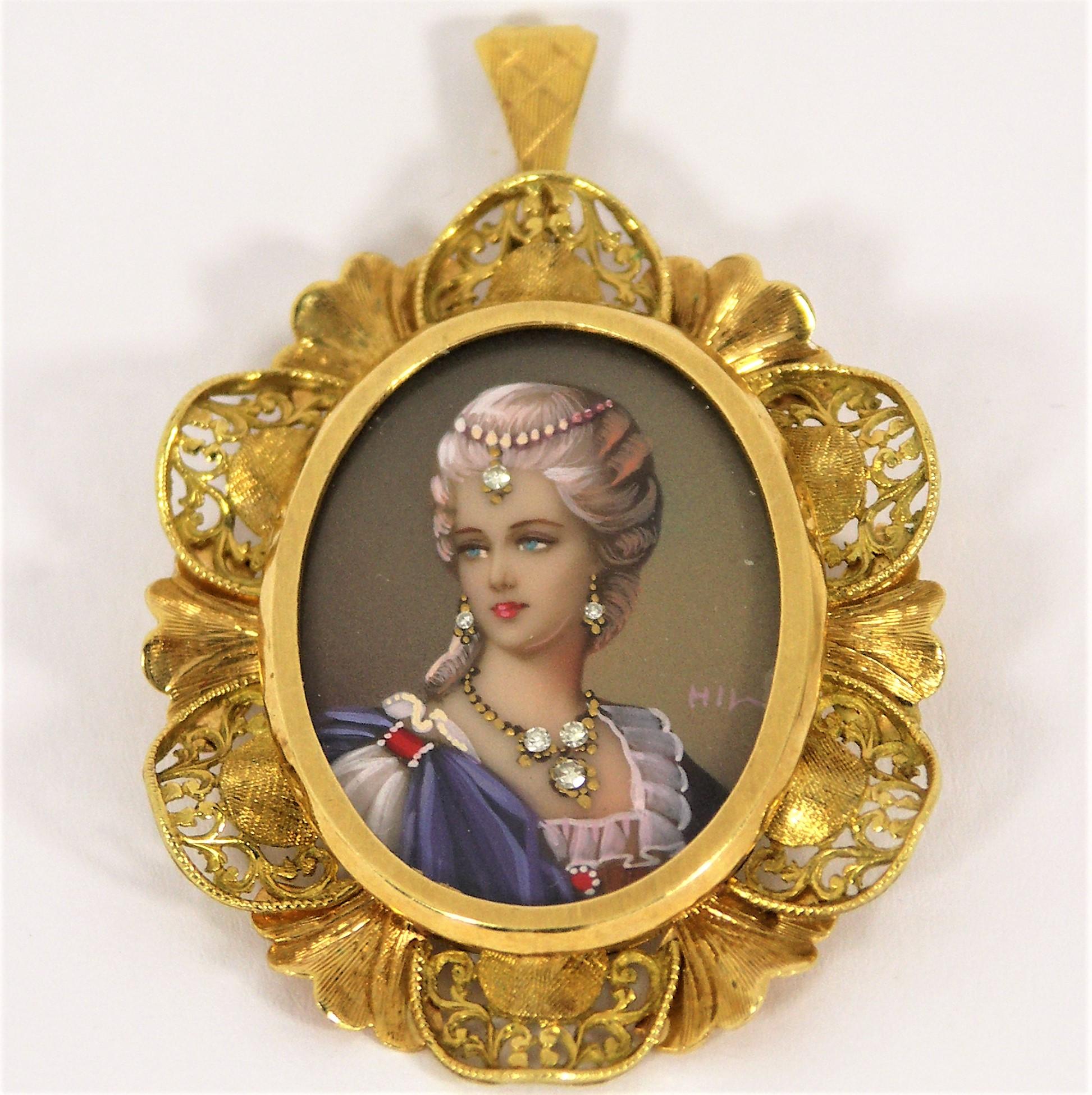 Made in the 1950s, this elegant 18K gold hand painted portrait pendant/brooch
shows the model wearing a diamond necklace, diamond earrings and a diamond headband. The six single cut diamonds weigh an approximate total of .05ct .
The lacy gold frame