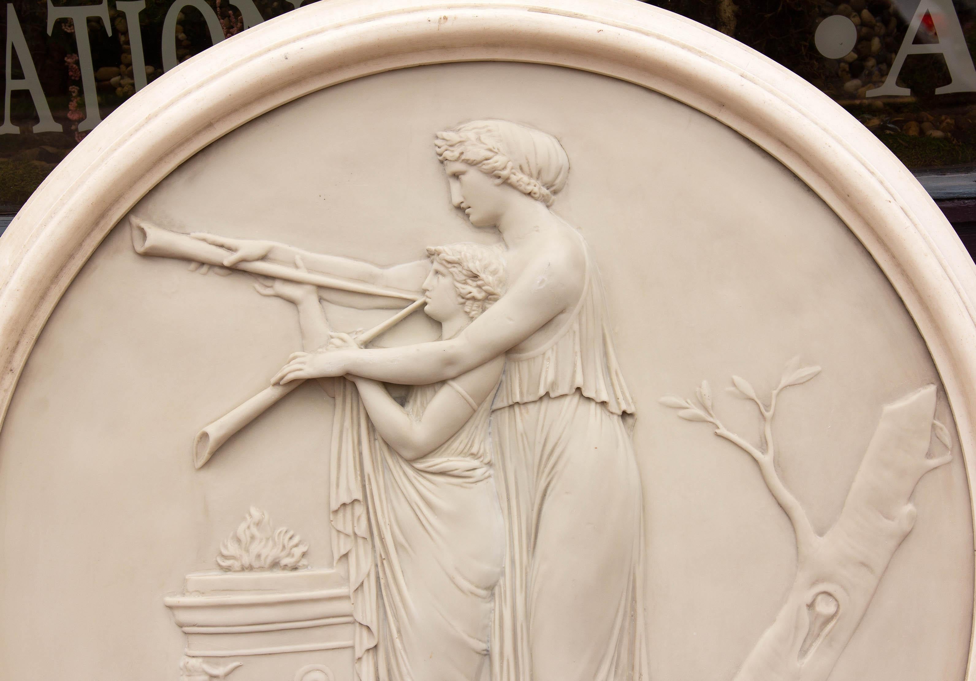 Classical Greek roundel wall sculpture. Faux marble. Quality cast resin, mid-20th century.