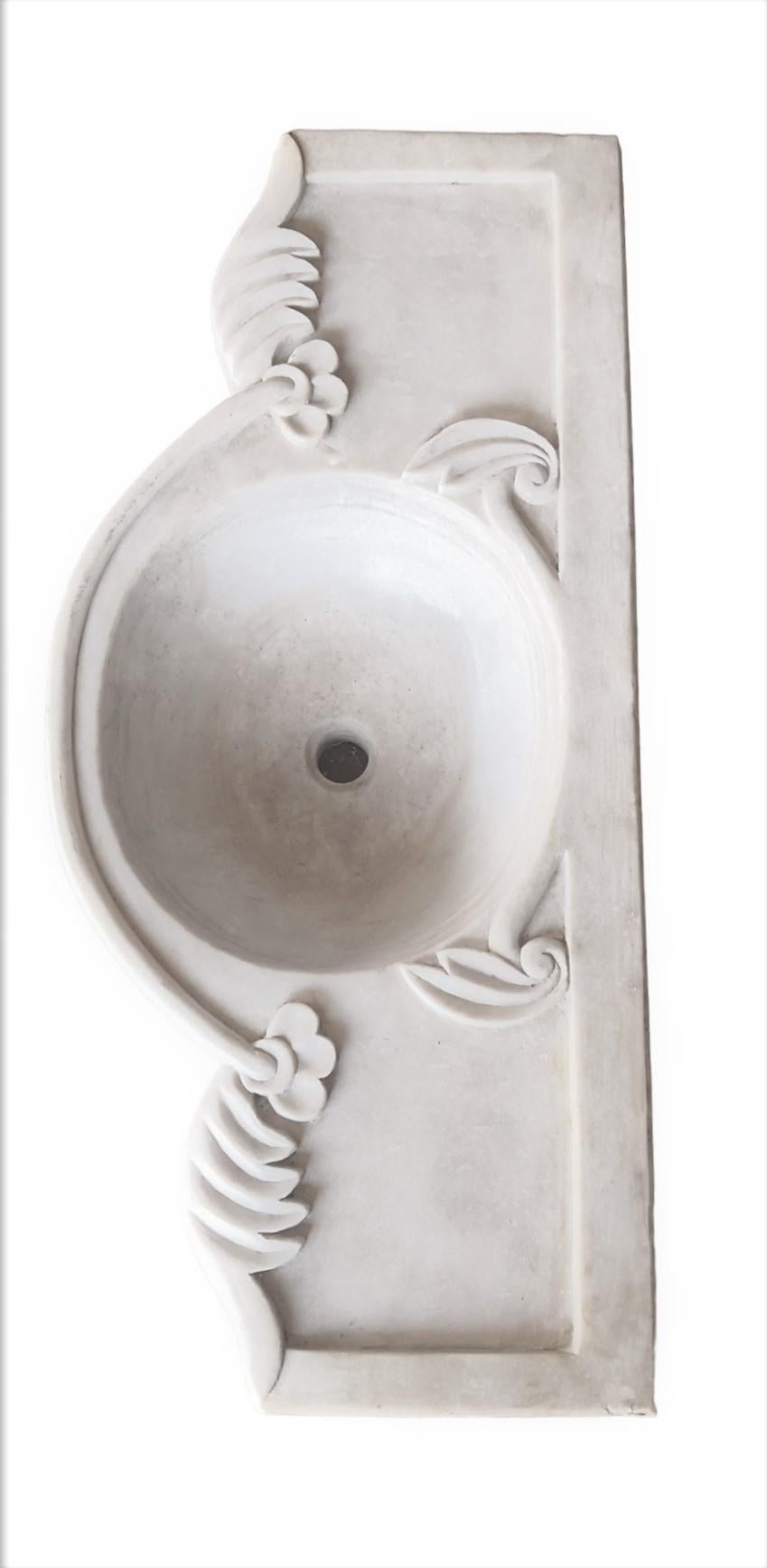 Classical hand carved marble sink basin

This timeless beautiful Italian classical sink is hand cut from one single block of white marble, these designs have not changed since Greek and Roman times and carries superb artistic merit easily fitting in