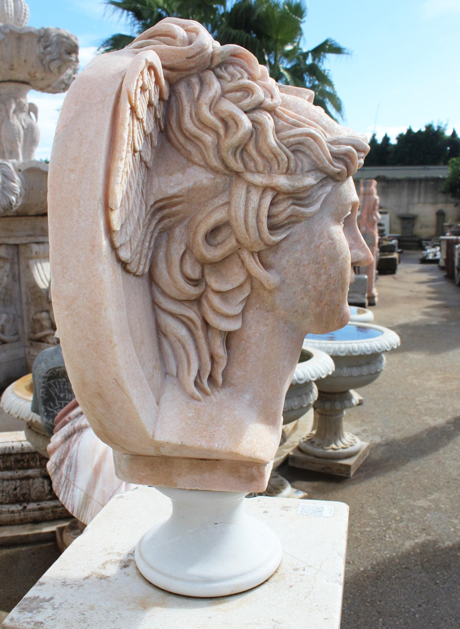 Italian Classical Hand Carved Portuguese Rosa Marble Two Faced Winged Bust For Sale