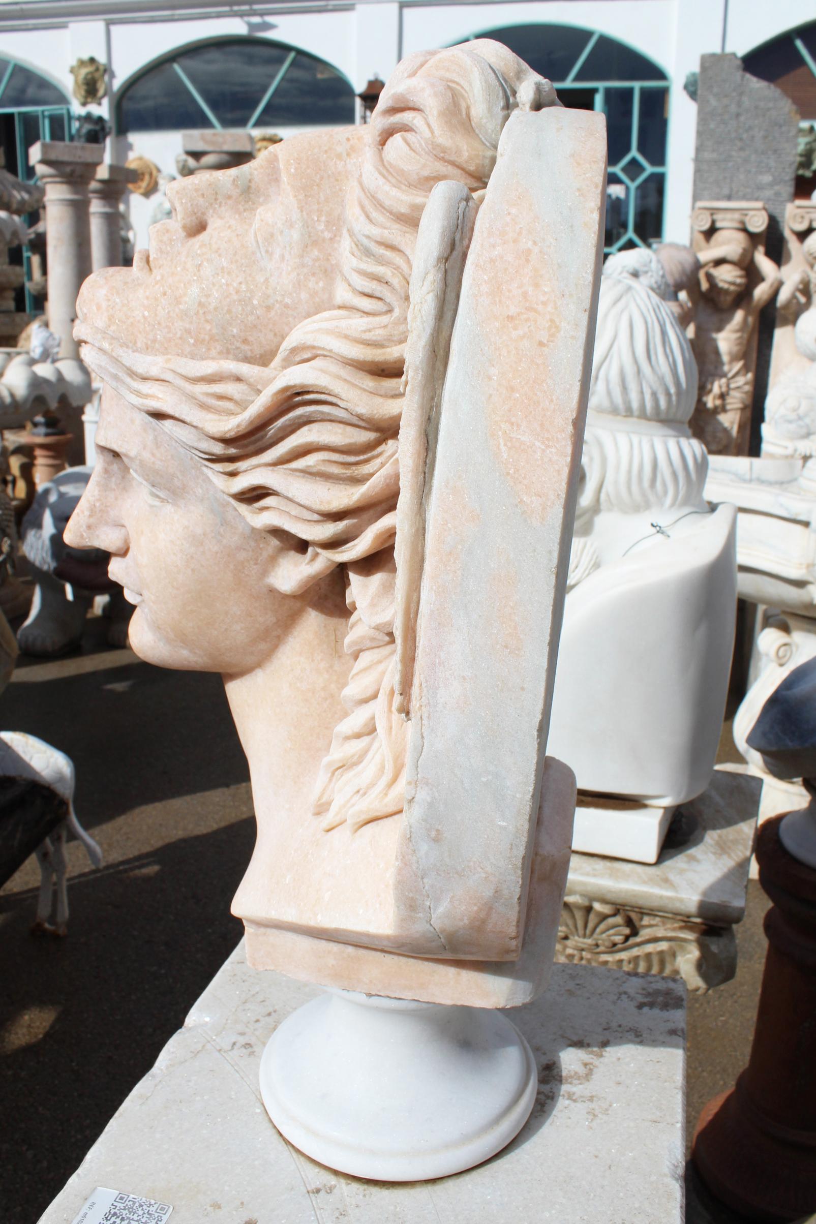 Classical Hand Carved Portuguese Rosa Marble Two Faced Winged Bust In Good Condition For Sale In Marbella, ES