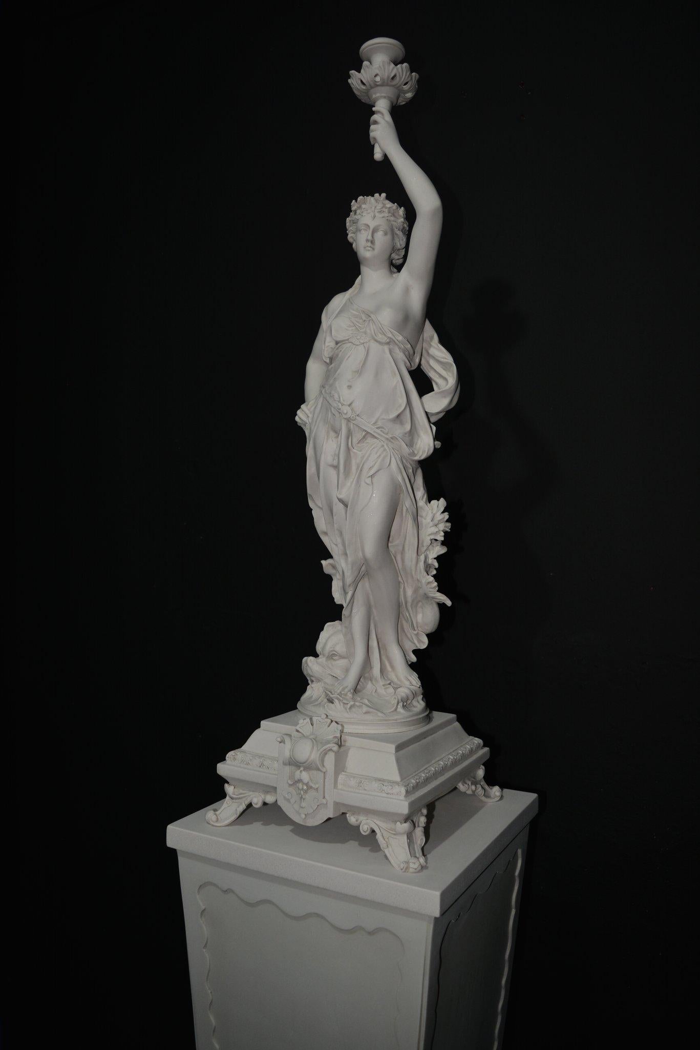 A superb Classical lady with candle mount marble sculpture, 20th century.
Lady Statuette, holding candle with merlion to base, French, circa 1790.
A fantastic classic marble sculpture center piece, comprising of a French school lady, in blowing