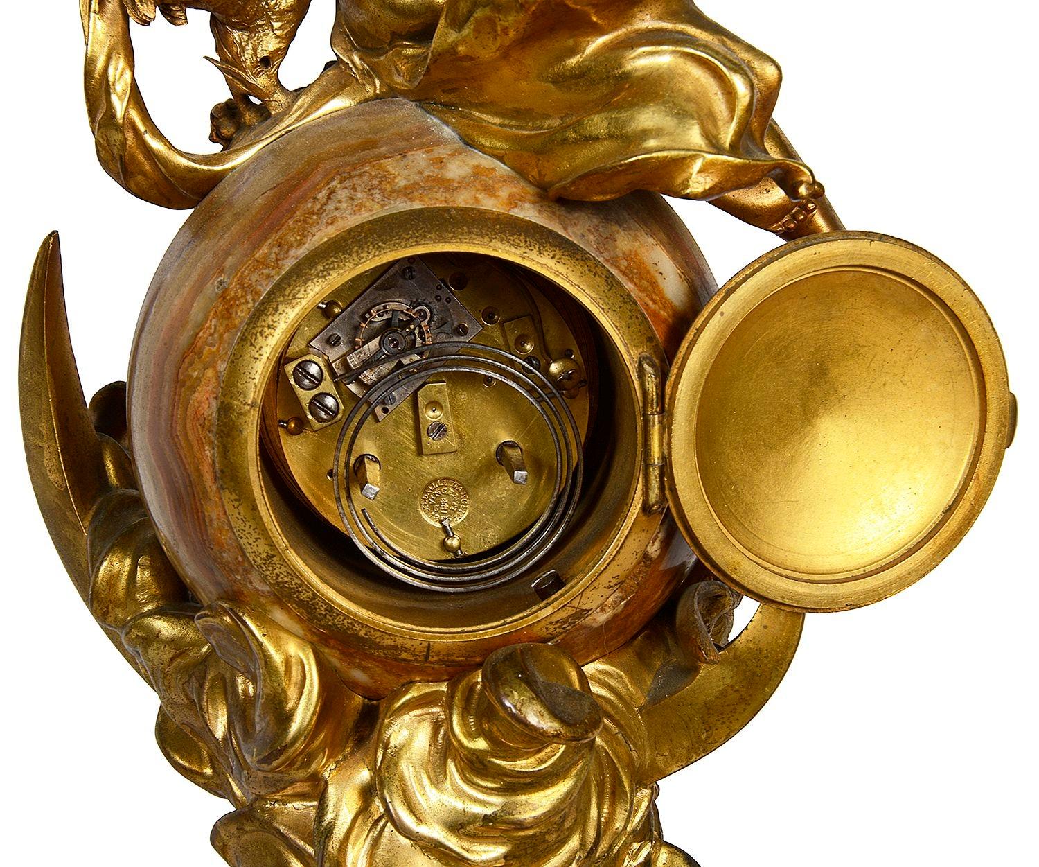 Ormolu Classical marble and ormolu mantle clock with Aurore seated above. 19th Century. For Sale