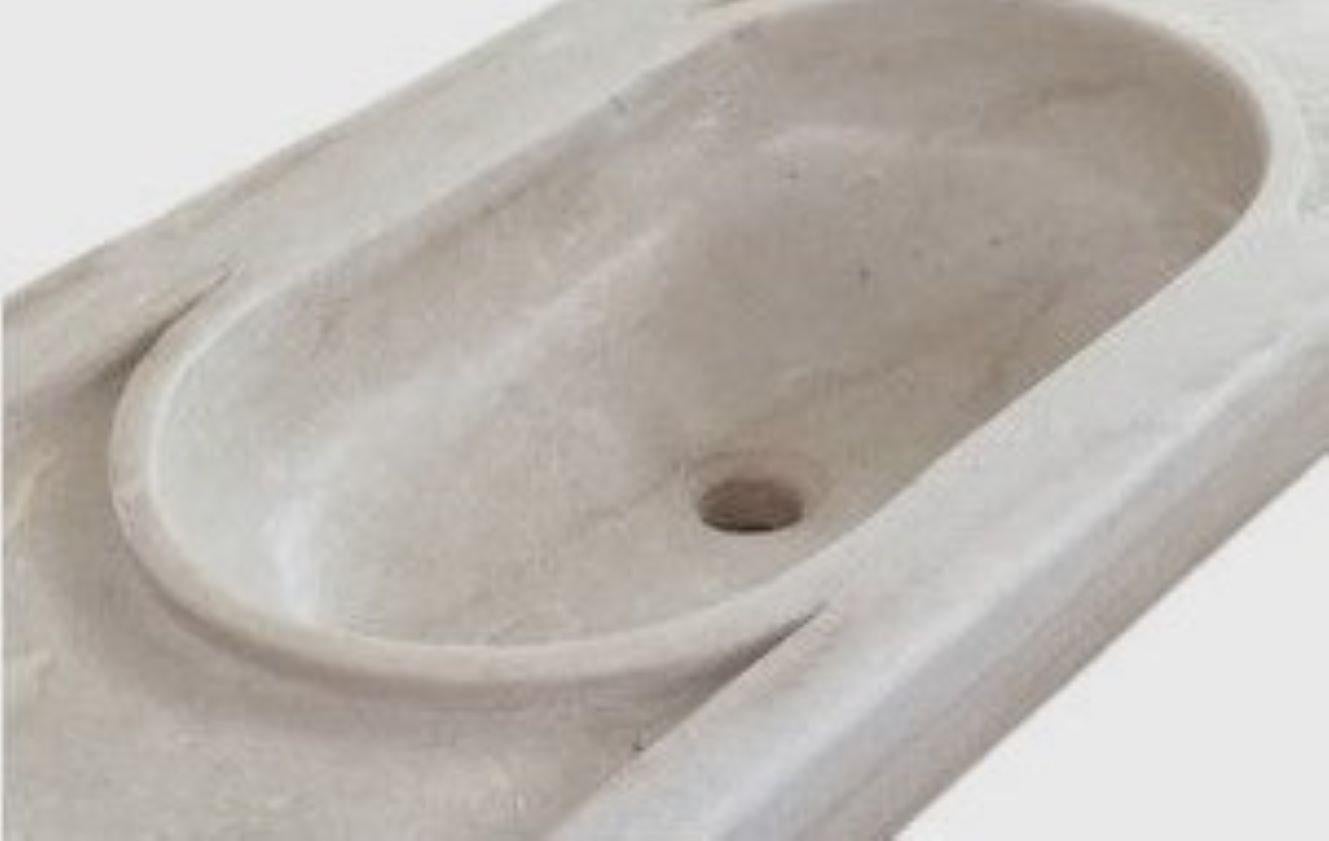 This timeless beautiful Italian classical sink is cut from one single block of white marble, these designs have not changed since Greek and Roman times, it carries superb artistic merit easily fitting in with old and new buildings.

Basin size 35 cm