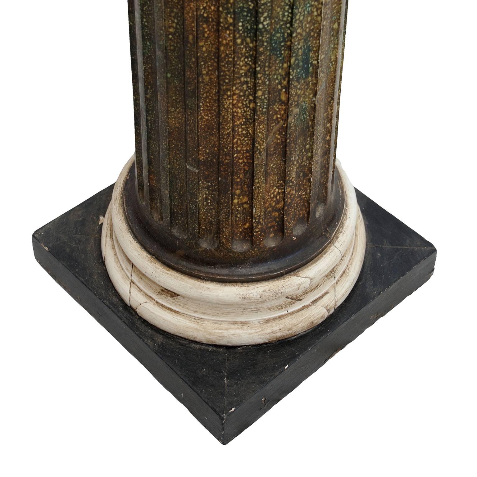 This is a wonderful Classical painted faux porphyry Doric Column of great proportions and slightly tapered form, circa 1860.