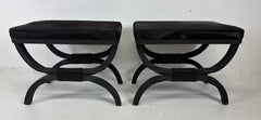 Classical pair of wrought iron benches with cowhide upholstery