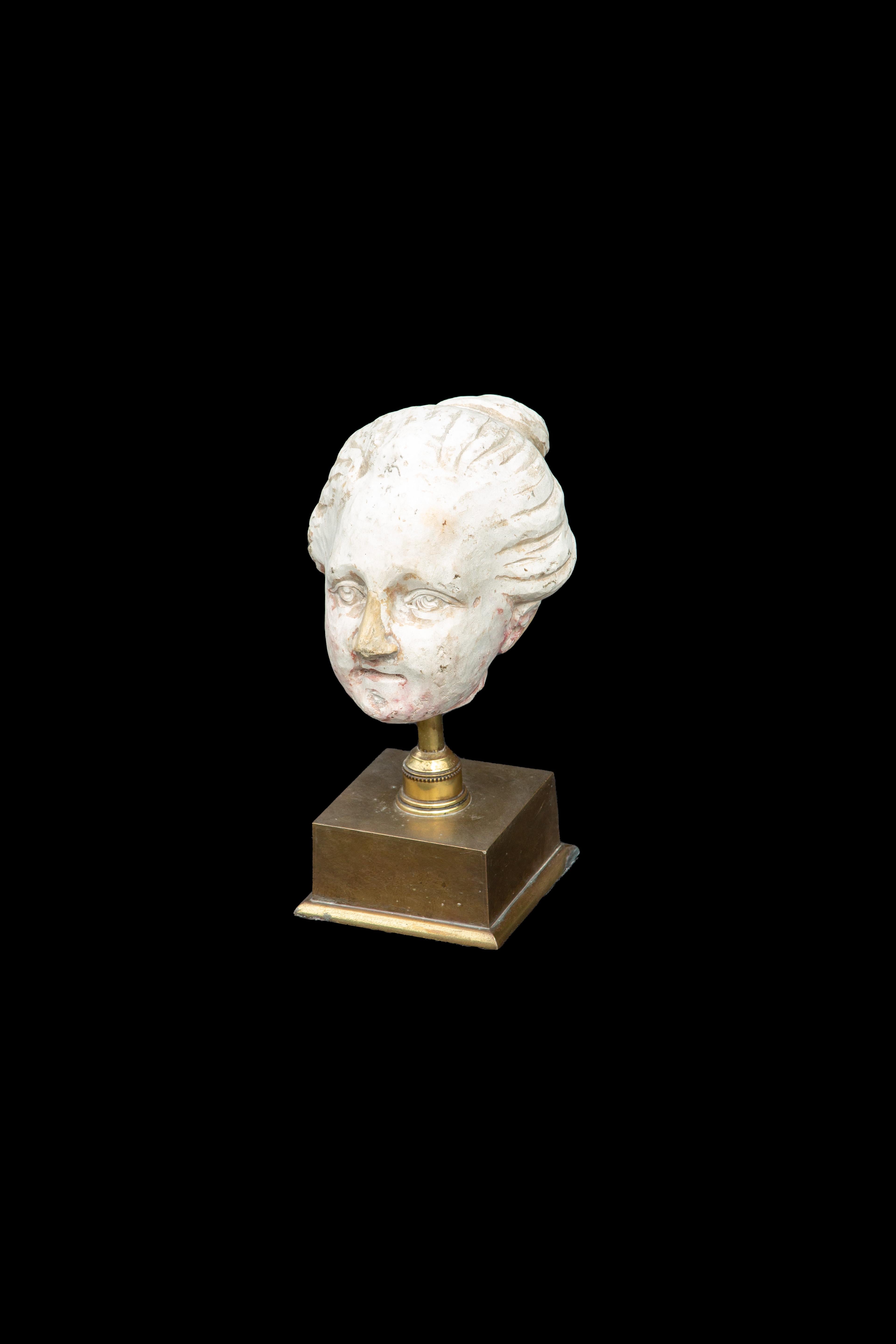 French Classical Plaster Head of a Woman on a Brass Base For Sale