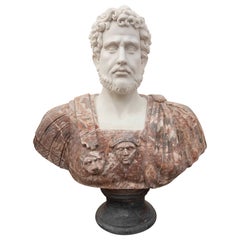 Busto classico in marmo rosso con ritratto di un imperatore romano