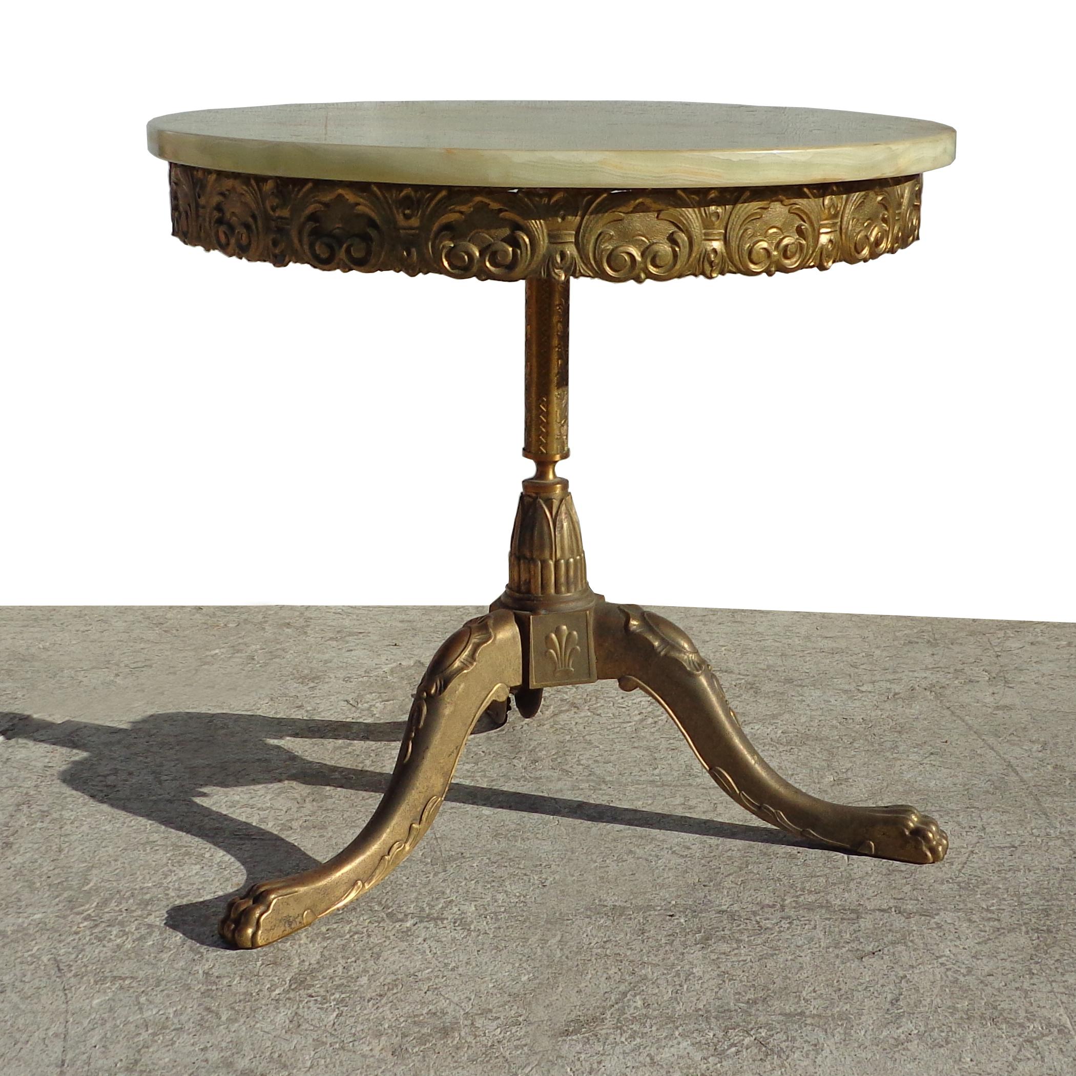 Classical Revival French onyx side table 

French gilt and onyx occasional table. Decorative base with cabriole feet.


Measures: 20.5