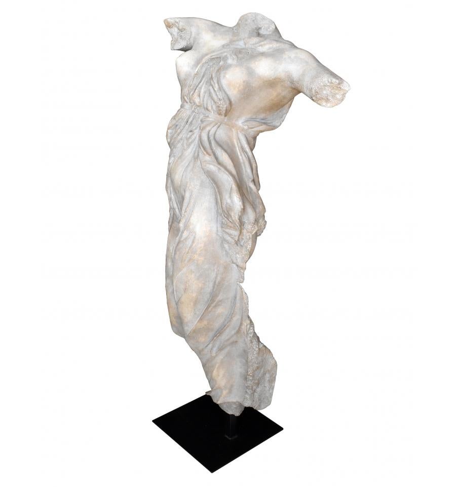 Classical Roman female dancing torso sculpture in resin imitating marble on an iron pedestal. Top quality antique imitation of the erosion and passing of time.
