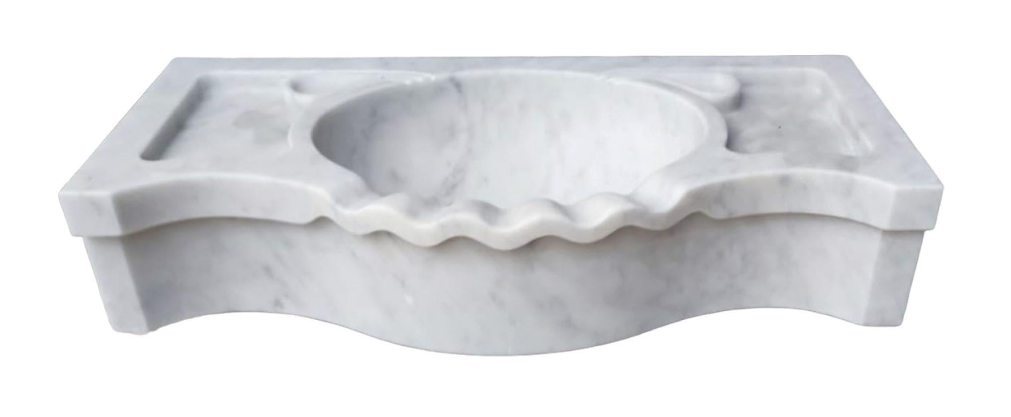 Classical Serpentine Marble Stone Sink Basin

This timeless beautiful Italian classical sink is cut from one single block of white marble, these designs have not changed since Greek and Roman times, it carries superb artistic merit easily fitting in