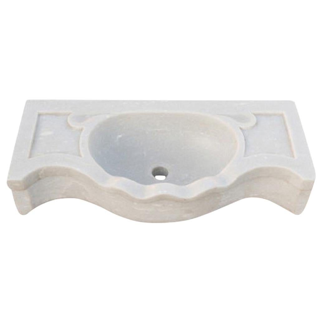 This timeless beautiful Italian classical sink is cut from one single block of white marble, these designs have not changed since Greek and Roman times, it carries superb artistic merit easily fitting in with old and new buildings.
It also makes an