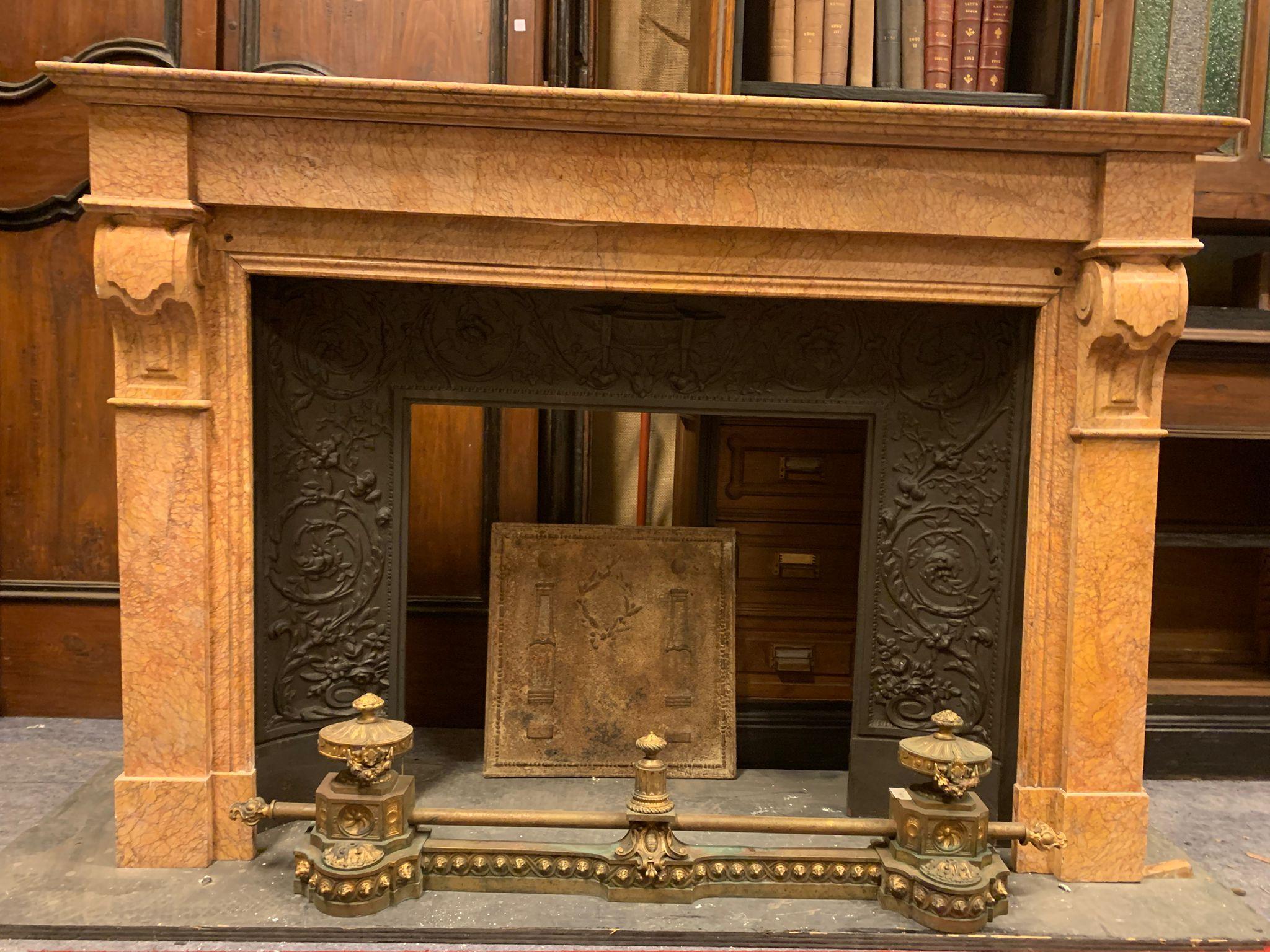 Carved Classical Siena yellow marble fireplace mantle, Italy For Sale