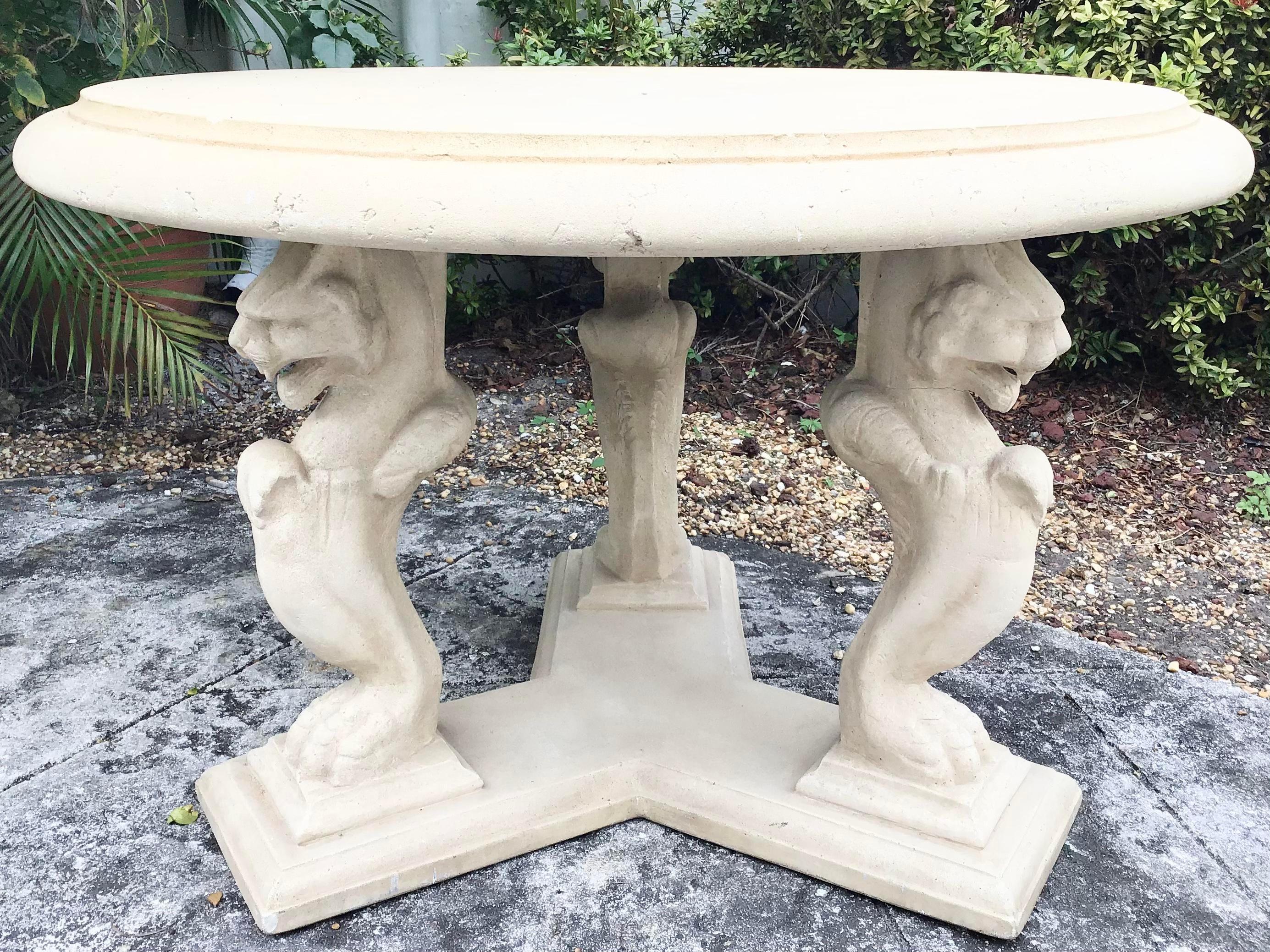 Beautiful round stone patio table with a nicely carved pedestal base. Add some elegance to your patio area with this Classical design.