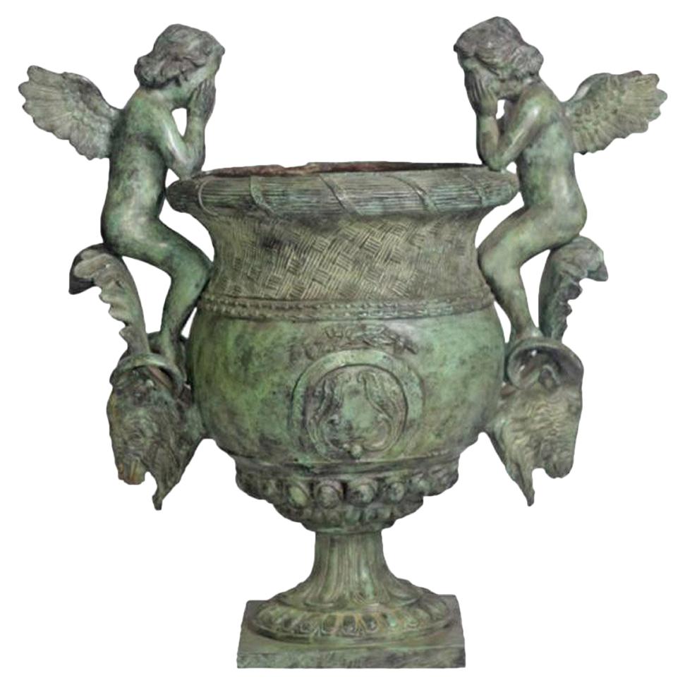 Classical Style Cast Bronze Urn with Two Cupids and Rams' Heads, Verde Patina