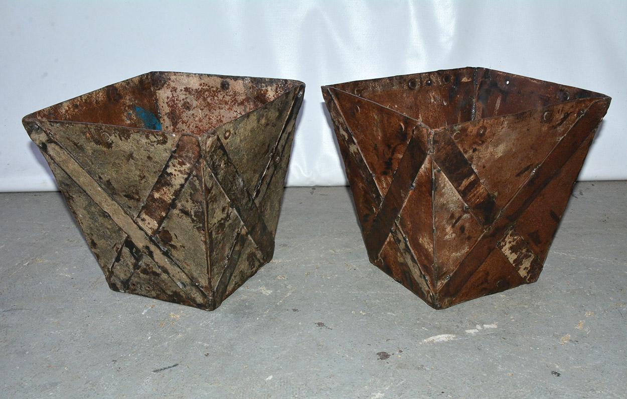 Rustic and classical at the same time, painted iron waste basket or trash can or planter with wonderful patina, X-design.  Waste basket, planter.
