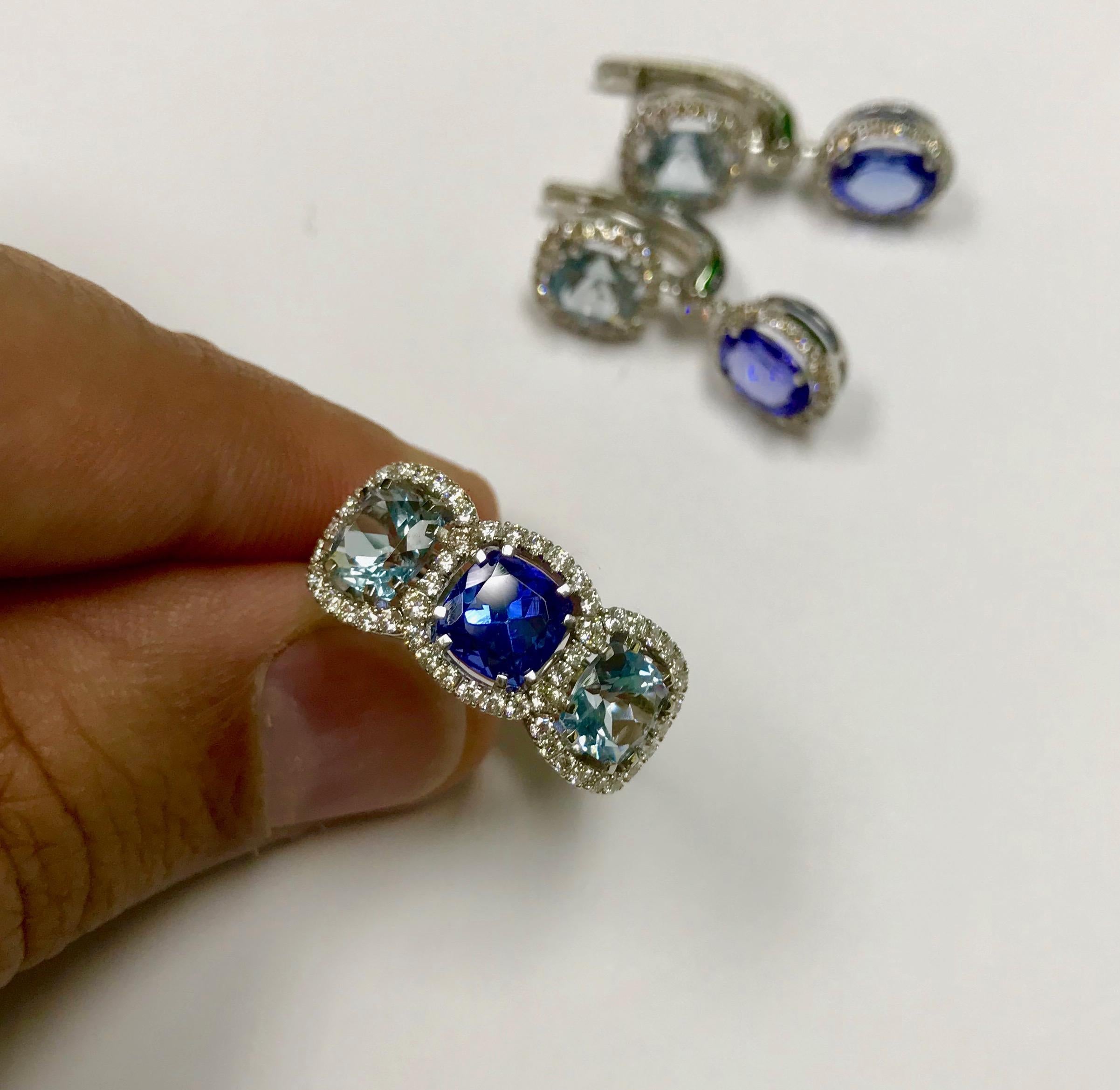 Classical Three-Stone ring with Tanzanite 1.48 carat, Aquamarine 1,96 carat and Diamonds 0,67 carat. 18 Karat White Gold Ring
Available in set with earrings LU116414714261

US Size  7 3/4
EU Size 55 7/8

10x24.5 mm
6.85 gm
