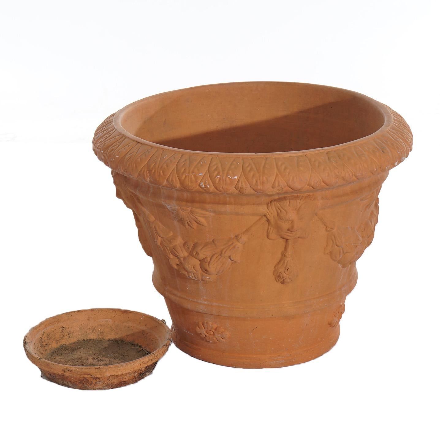***Ask About Reduced In-House Shipping Rates - Reliable Service & Fully Insured***
Classical Terracotta Pottery Jardiniere with Figural Masks & Fruit Swag 20thC

Measures- 16.5''H x 21.75''W x 21.75''D; 2.25'' x 10'' 