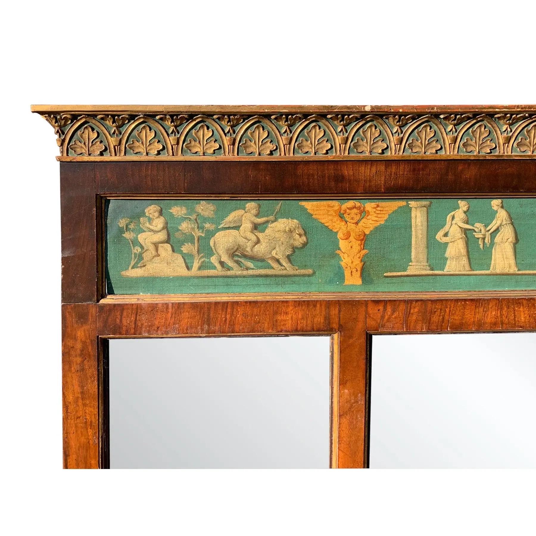Un espejo horizontal clásico de tres paneles. De madera con chapas decorativas. Arriba hay un óleo sobre lienzo, ricamente tallado en la parte superior con un motivo de hojas de higuera y arcos. Continental, hacia 1820.