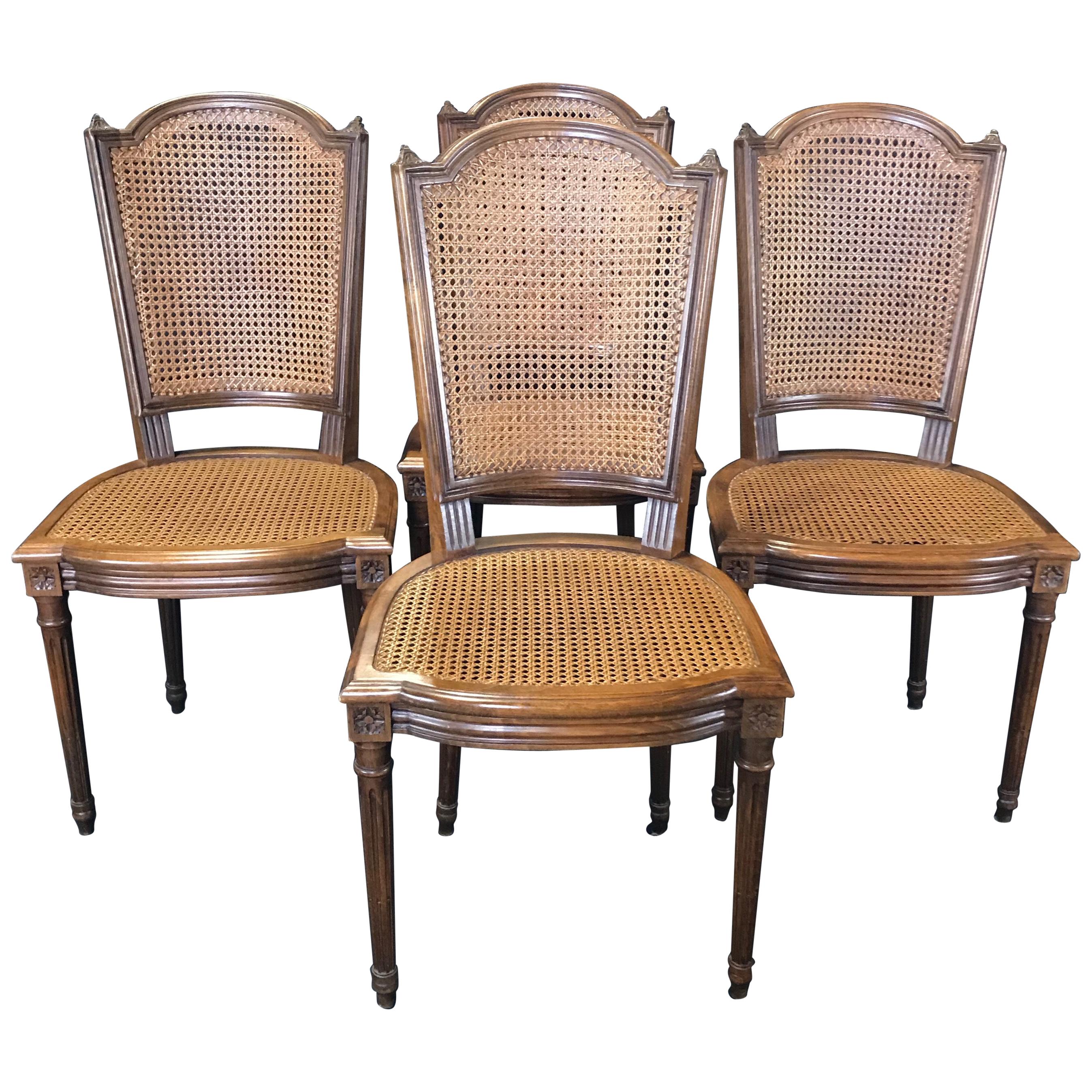 Classically Beautiful Set of 4 French Louis XVI Walnut and Caned Dining Chairs