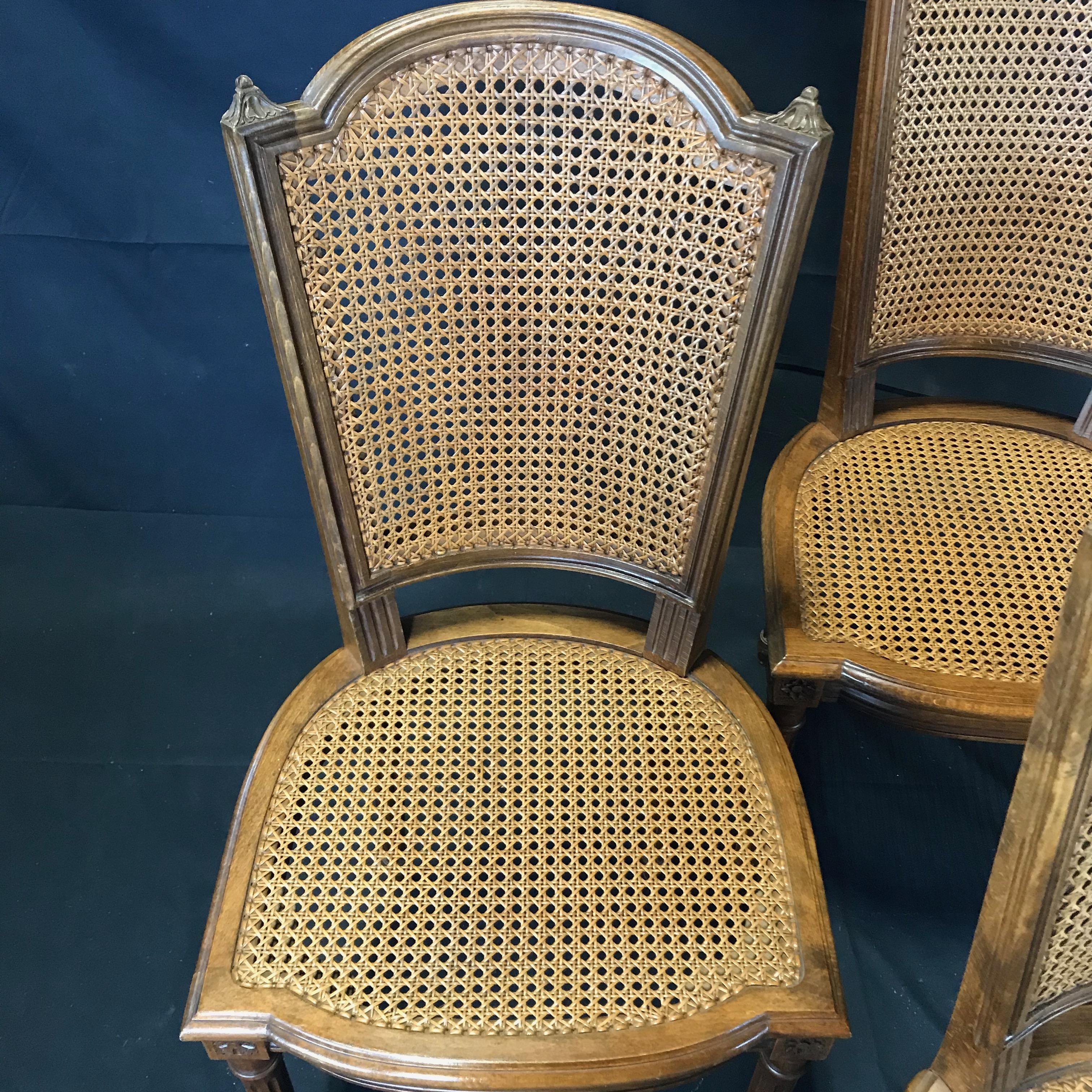Classically Beautiful Set of 4 French Louis XVI Walnut and Caned Dining Chairs 1