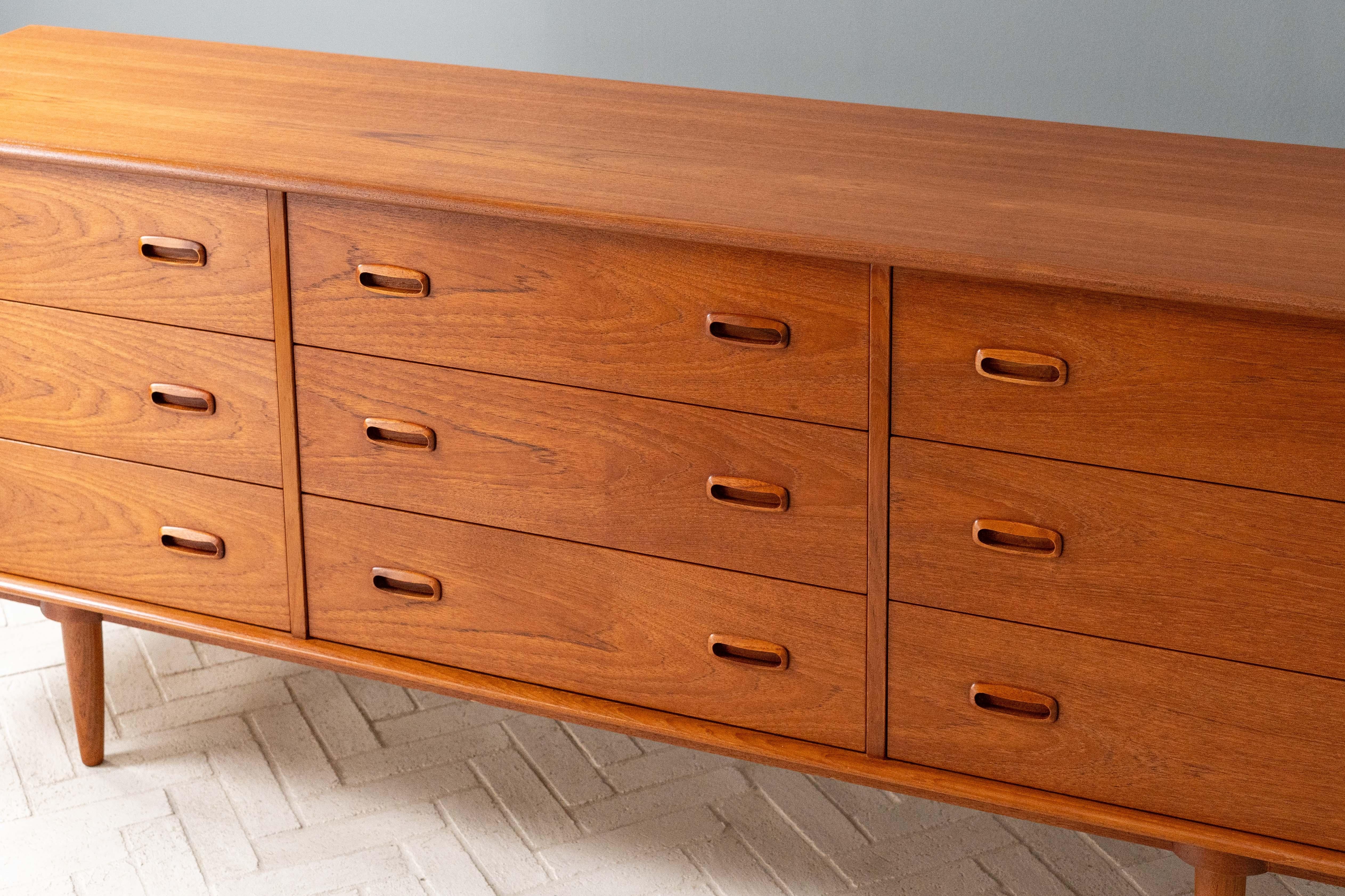 Canada, ca. 1960s. A beautifully made long dresser by Inter-Continental Design, Ltd. Very much brings to mind the designs of Danish furniture makers Kai Kristiansen or Børge Mogensen. Features teak construction with nine generous storage drawers -