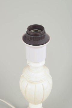 Classically shaped table lamp crafted in white marble. Italy, 1970s