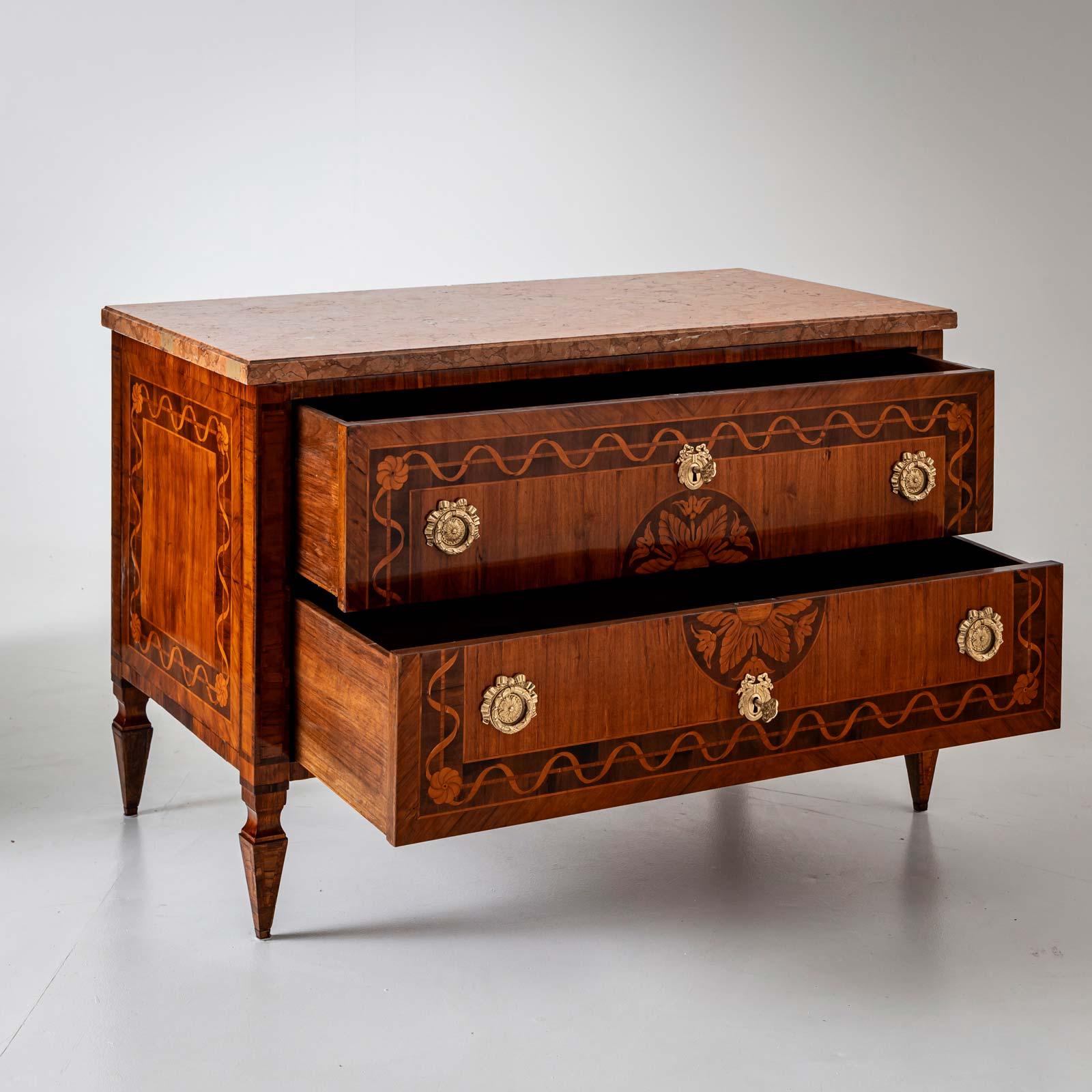 Classicist chest of drawers from Italy around  1790 in cherry veneer with a Rosso Verona marble top. The chest of drawers has been expertly restored and polished by hand.