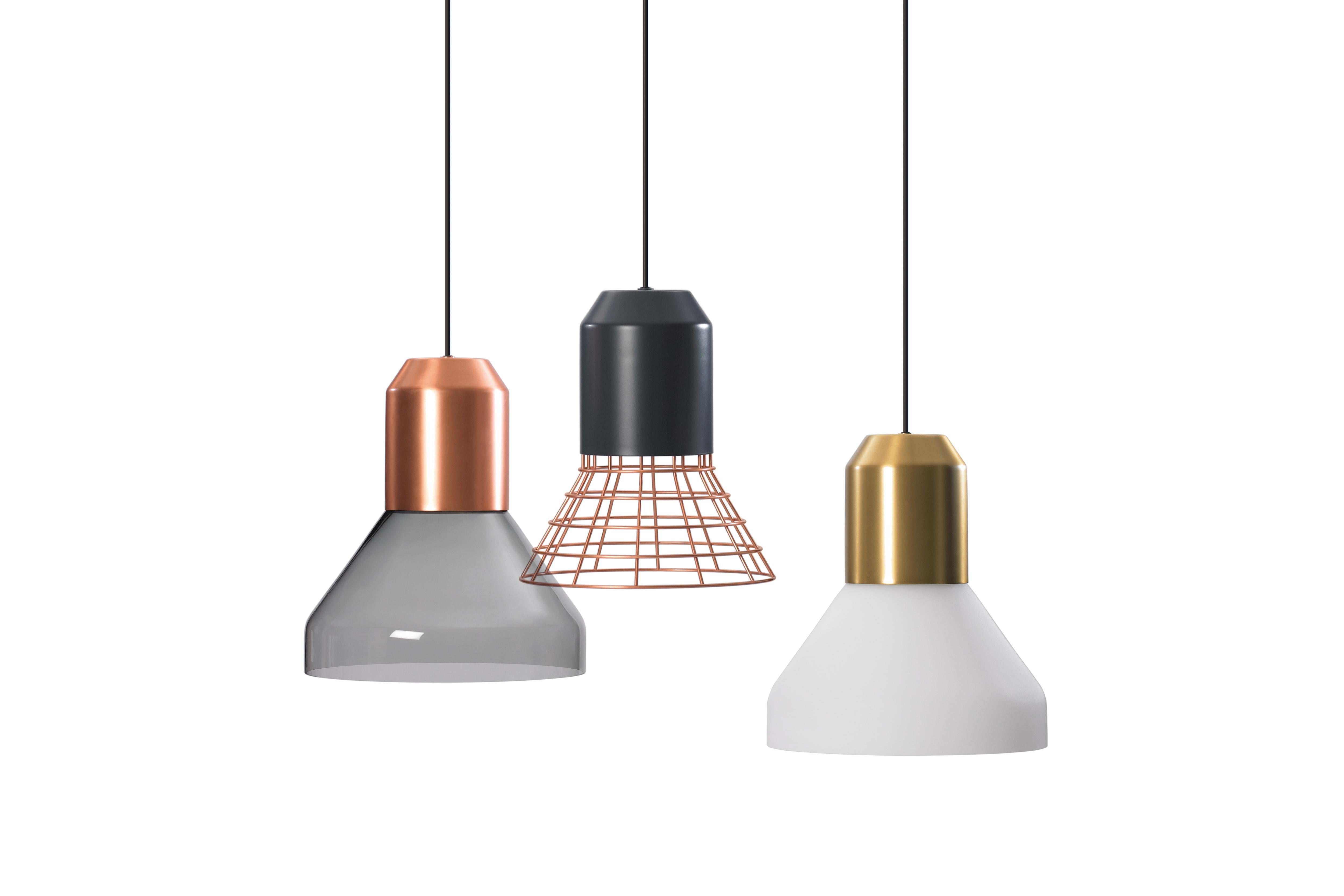 Sebastian Herkner’s Bell Lights reveal their adaptability and flexibility at the very first glance. Each of the lampshades in this family of pendant lamps can be combined with a choice of sleek cylindrical bulb sockets in grey, brass or copper and