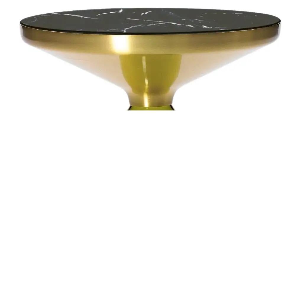 MARBLE TOP

A modern classic as miniature: the bell table by Sebastian Herkner turns our perceptual habits on their head, using the lightweight, fragile material of glass as base for a metal top that seems to float above it. Hand blown in the