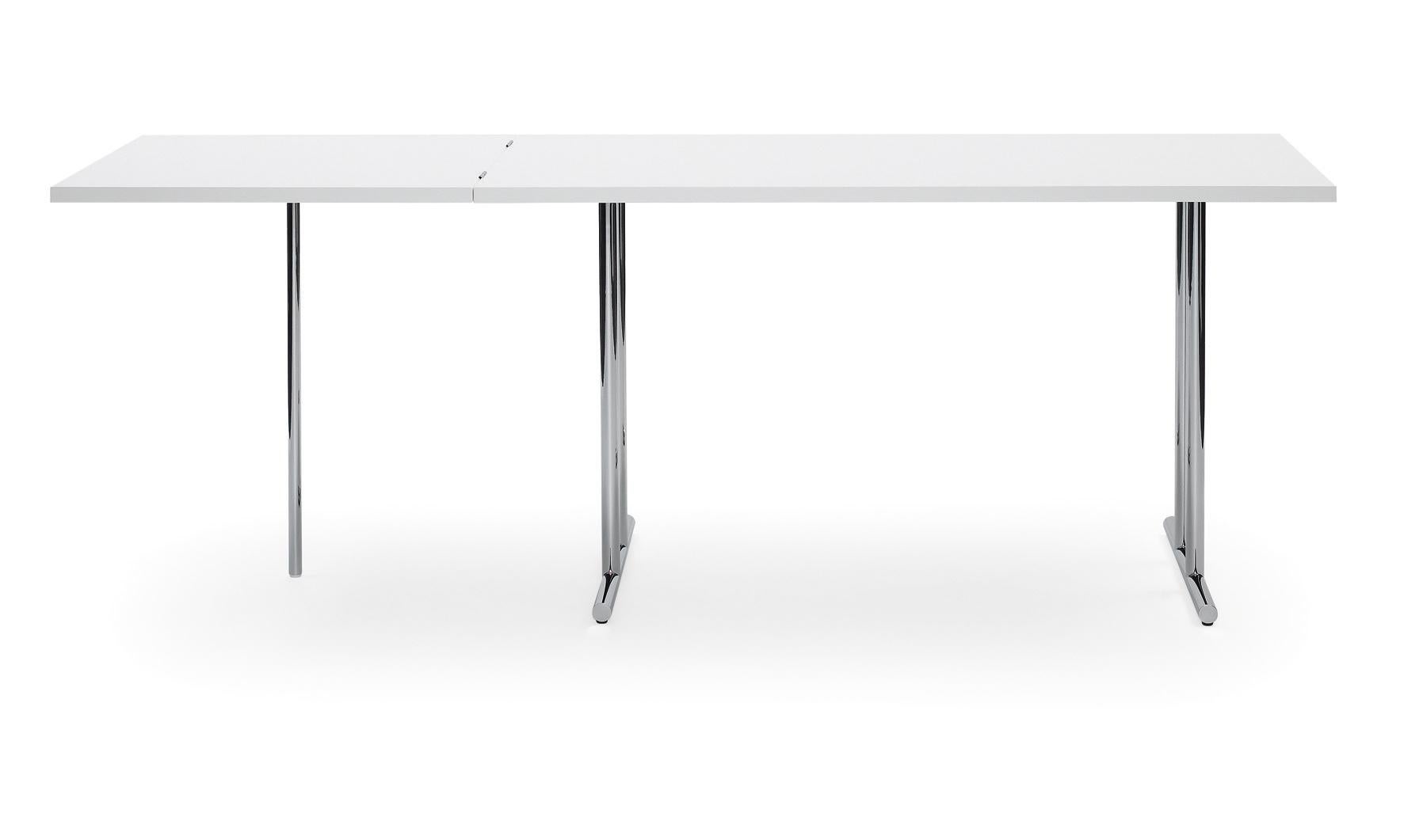 Like the majority of Eileen Gray‘s tables, this one too can transform itself. And as always she found an unexpected solution. The folding section of the tabletop is supported by a single leg out of chromium plated steel tubing – a conscious break in