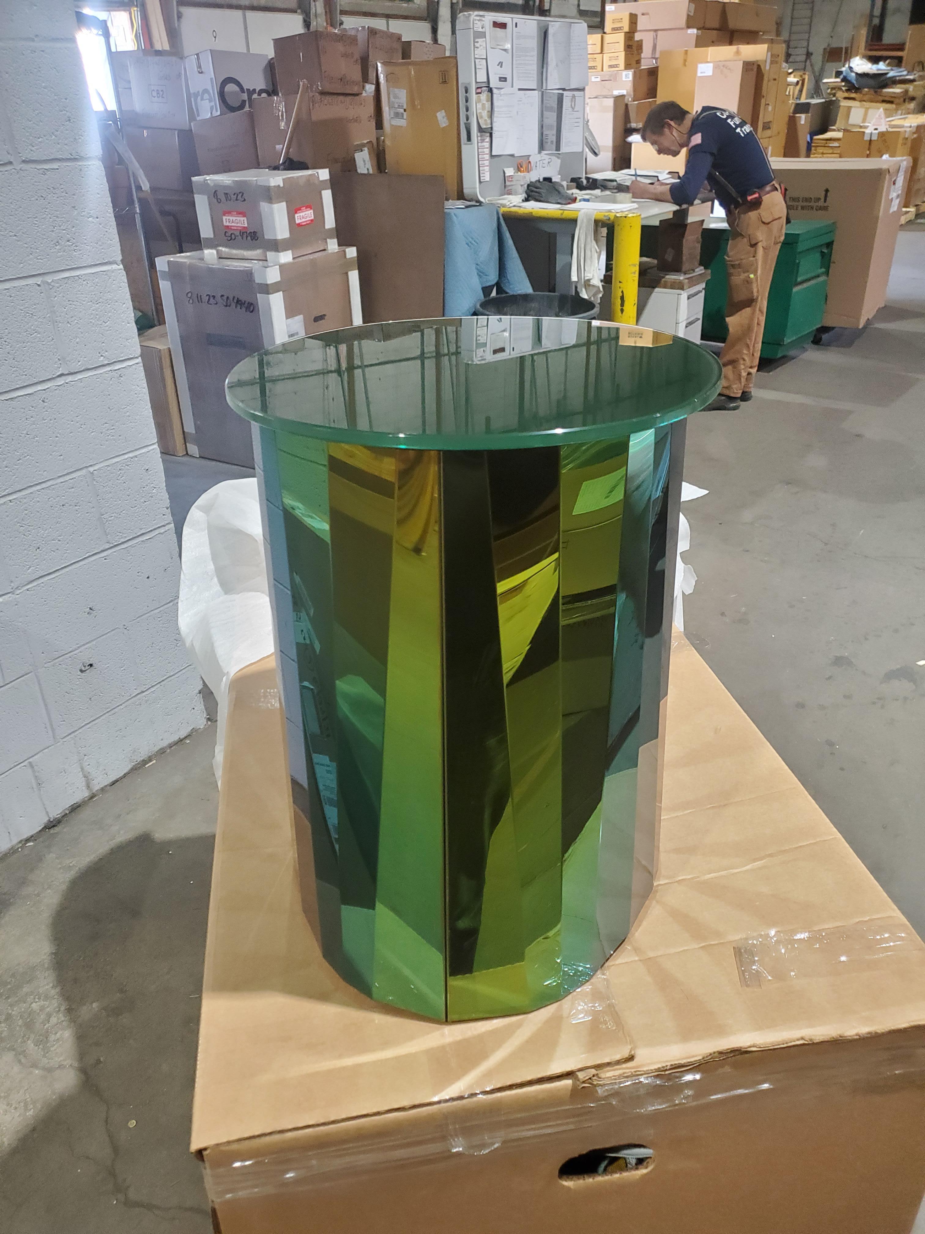 With the Pli table series French designer Victoria Wilmotte brings objects of unusual crystalline elegance and astonishing geometry to living environments. The bends and folds that gave Pli its name almost make the stainless steel base look like an