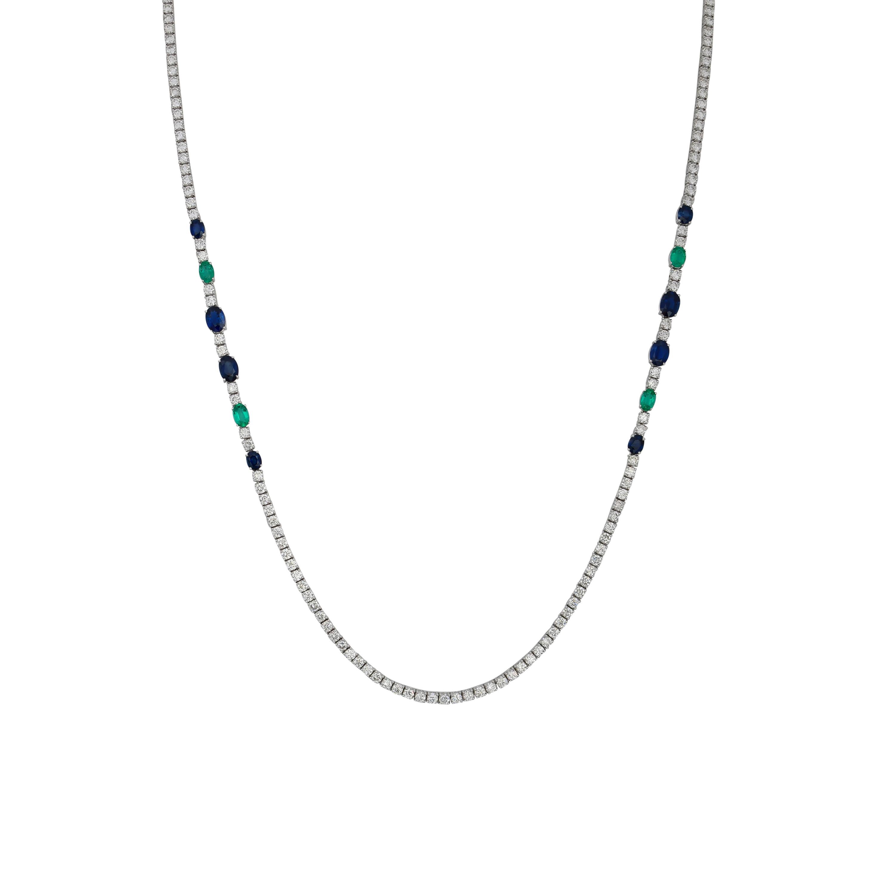 A classic long diamond necklace with a colorful twist with accents of vibrant blue sapphires and emeralds. A timeless piece that will never go out of style and will only appreciate in value over time. Exclusively by Sunita Nahata Fine