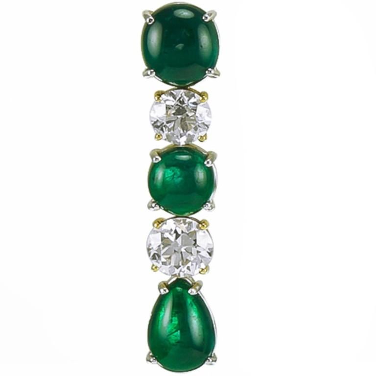 Elegant platinum with six cabochon emeralds with a total weight of 13.72 carat and four old european cut diamonds weighing 4.96 carat earrings