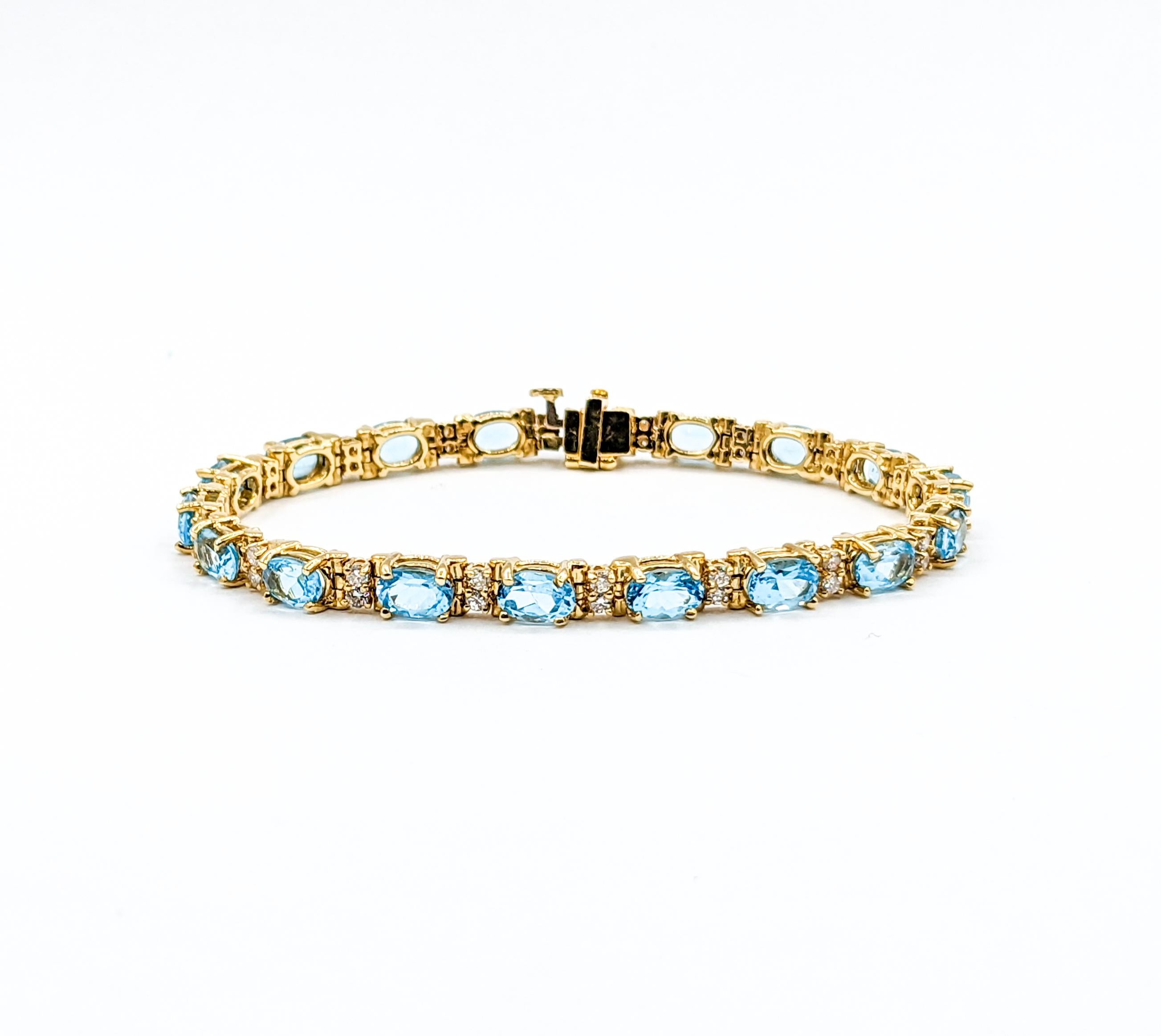 Classy Diamond & Blue Topaz Tennis Bracelet in Gold

Elevate your style with our stunning bracelet, crafted from lustrous 14k yellow gold and adorned with a mesmerizing .50ctw of round diamonds. These diamonds are I1 clarity and J-K color, providing