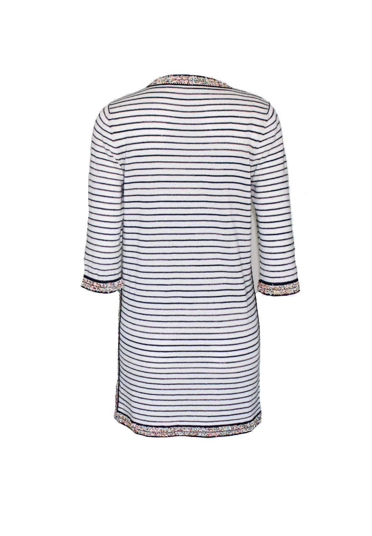 Striped signature cashmere mix dress by Chanel
So versatile, can be worn as a dress, tunic, top etc.
A timeless classic
Simply slips on
Amazing multicolor beading on hem, sleeves, neck, pockets and full sides
Finest cashmere mix knit
Two front