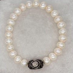 Classy Freshwater white pearl diamond bead sterling silver stretch bracelet