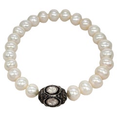 Classy Freshwater white pearl diamond bead sterling silver stretch bracelet