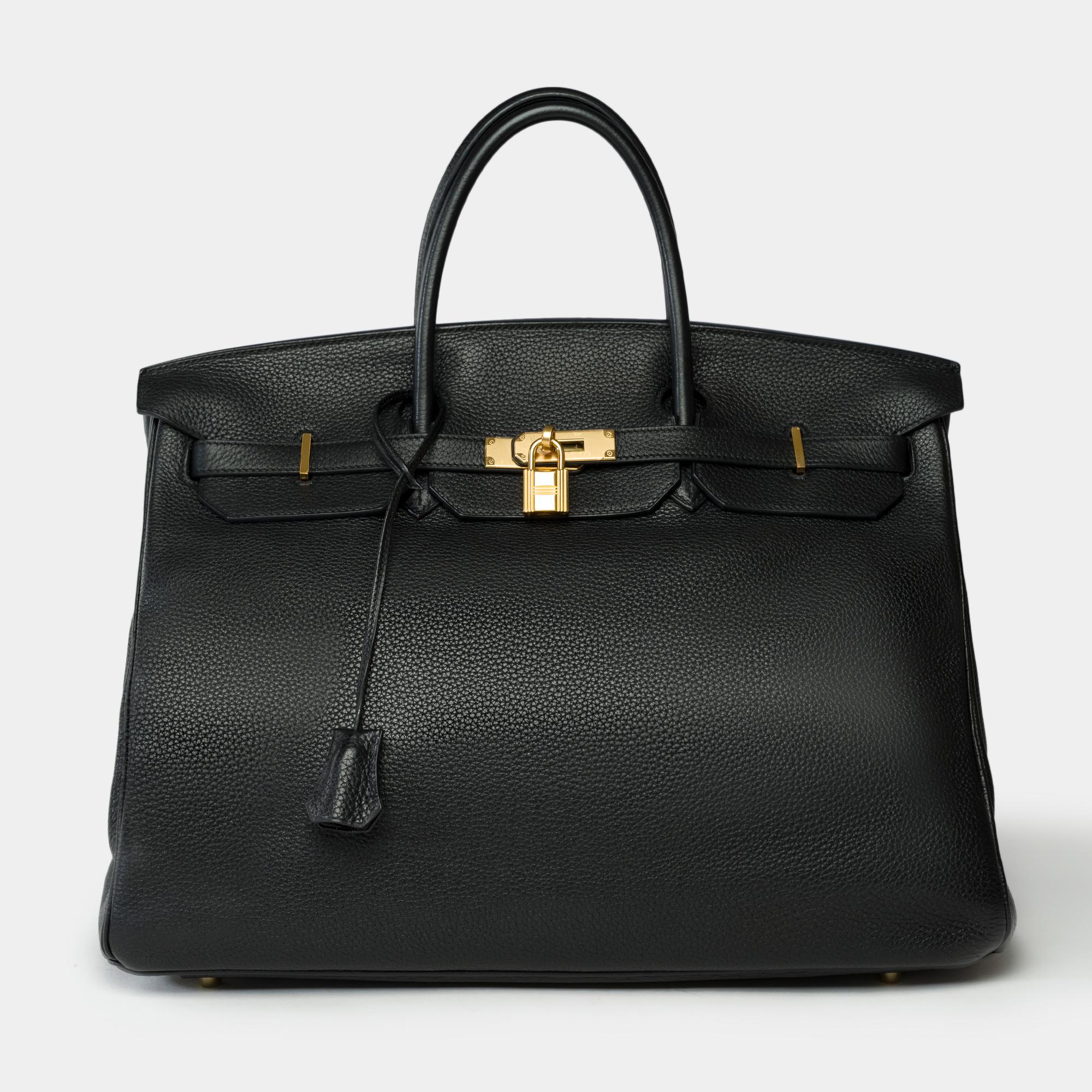 Stunning​ ​Hermes​ ​Birkin​ ​40​ ​handbag​ ​in​ ​black​ ​Togo​ ​leather,​ ​gold-plated​ ​hardware,​ ​double​ ​black​ ​leather​ ​handles​ ​for​ ​hand​ ​carry

Flap​ ​closure​ ​
Black​ ​leather​ ​interior,​ ​one​ ​zippered​ ​pocket,​ ​one​ ​flat​