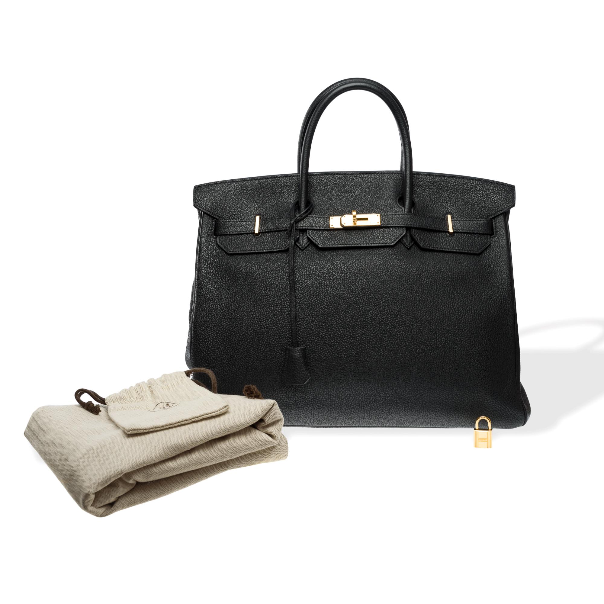 Beautiful​ ​Hermes​ ​Birkin​ ​40​ ​handbag​ ​in​ ​black​ ​Togo​ ​leather,​ ​with​ ​gold​ ​metal​ ​hardware,​ ​double​ ​black​ ​leather​ ​handles​ ​for​ ​hand​ ​carry

Flap​ ​closure
Black​ ​leather​ ​interior​ ​lining,​ ​one​ ​zip​ ​pocket,​ ​one​