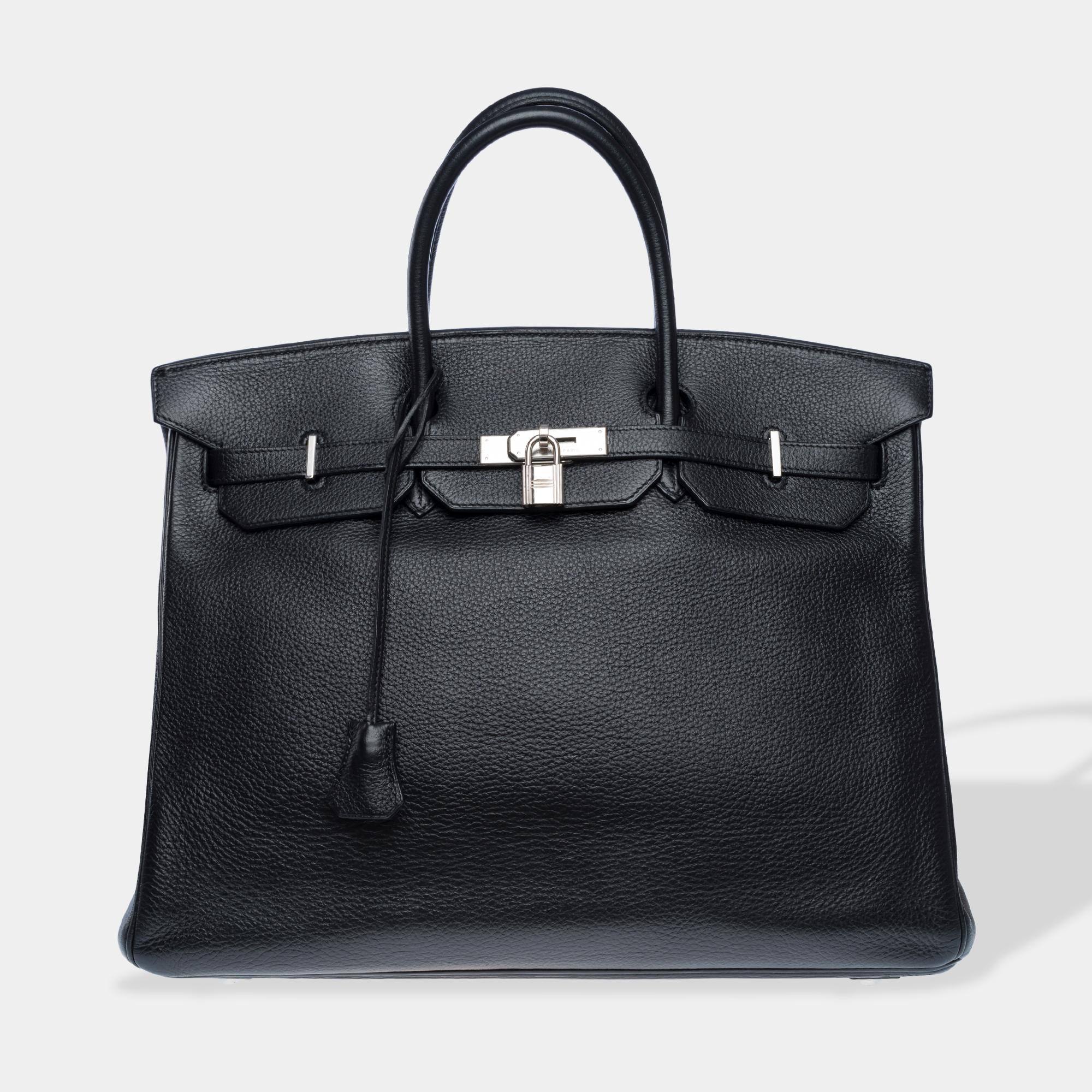 Stunning​ ​Hermes​ ​Birkin​ ​40​ ​handbag​ ​in​ ​black​ ​Togo​ ​calf​ ​leather,​ ​silver​ ​palladium​ ​metal​ ​trim,​ ​double​ ​black​ ​leather​ ​handles​ ​allowing​ ​for​ ​hand​ ​carry

Closure​ ​with​ ​flap
Black​ ​leather​ ​interior​ ​lining,​