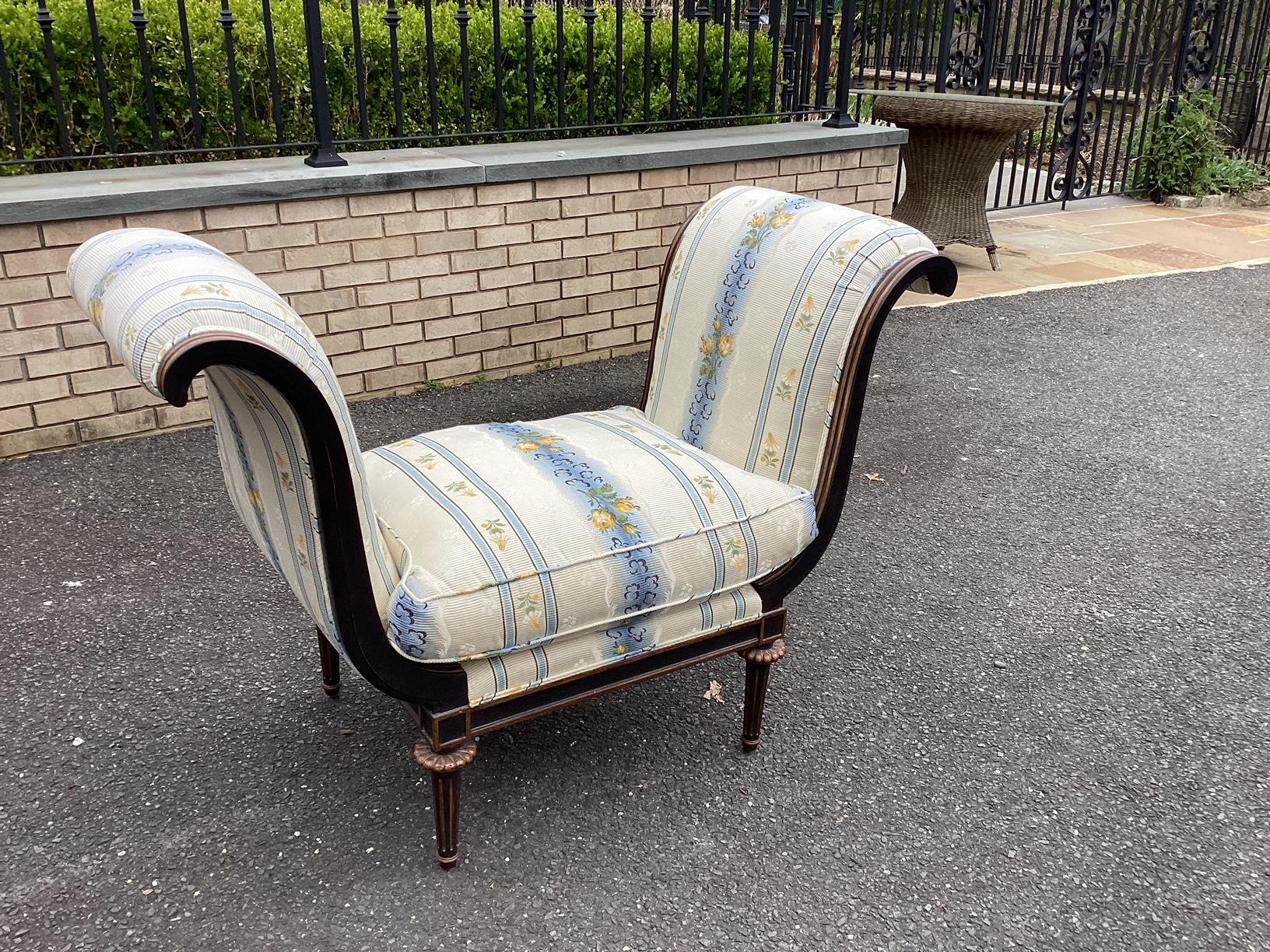 Exquisite Nancy Corzine bench having black painted legs with gold accents and a stunning, rich white and blue silk stripe and floral upholstery. The sides are stylishly curved and tall.
