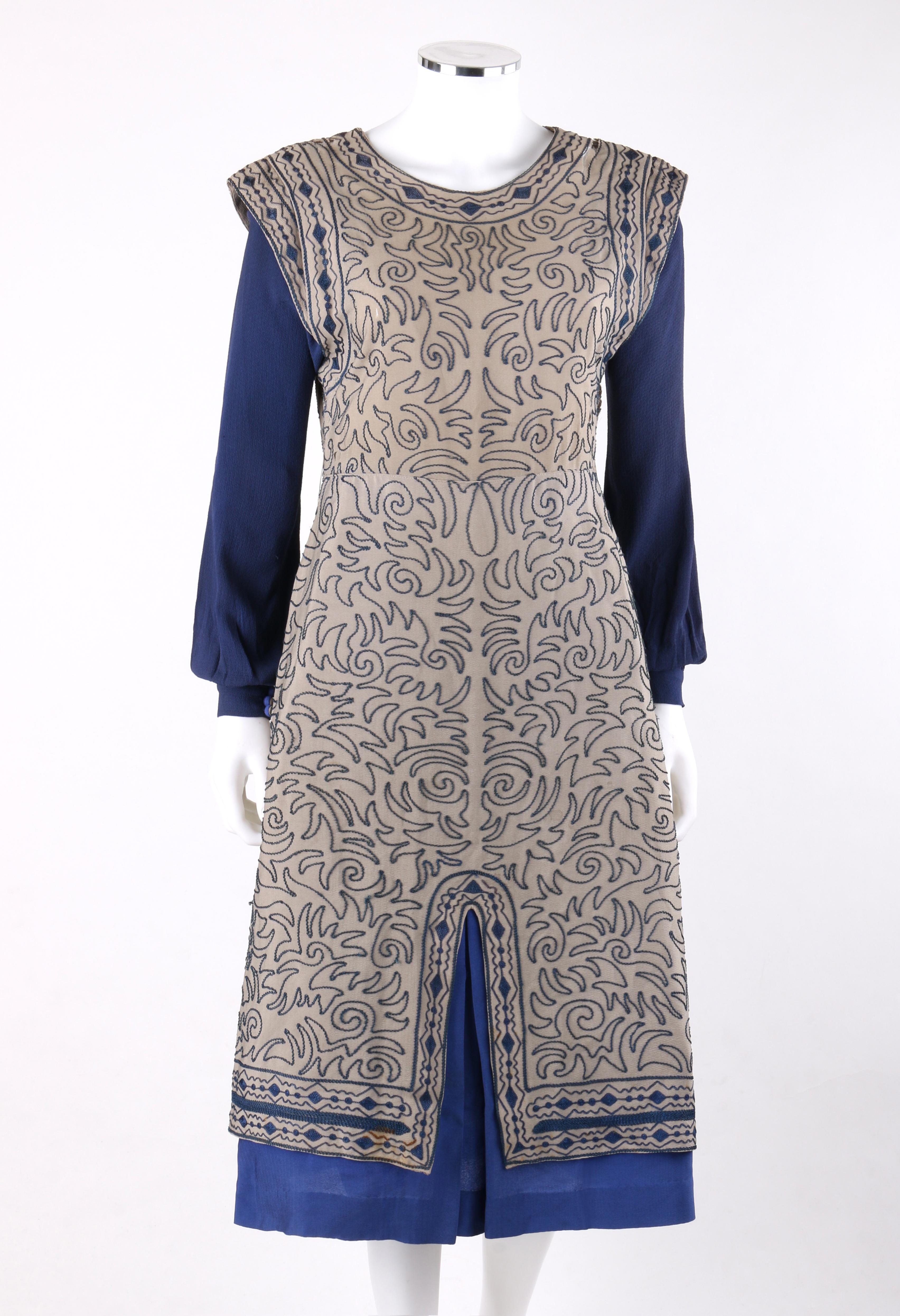 CLASSY JEAN c.1910’s Edwardian Satouche Embroidered Shell Silk Bishop Sleeve Midi Dress

Brand / Manufacturer: Classy Jean Dresses Inc
Circa: 1920’s 
Style: Midi Dress
Color(s): Shades of tan and blue
Lined: No 
Unmarked Fabric Content (feel of):